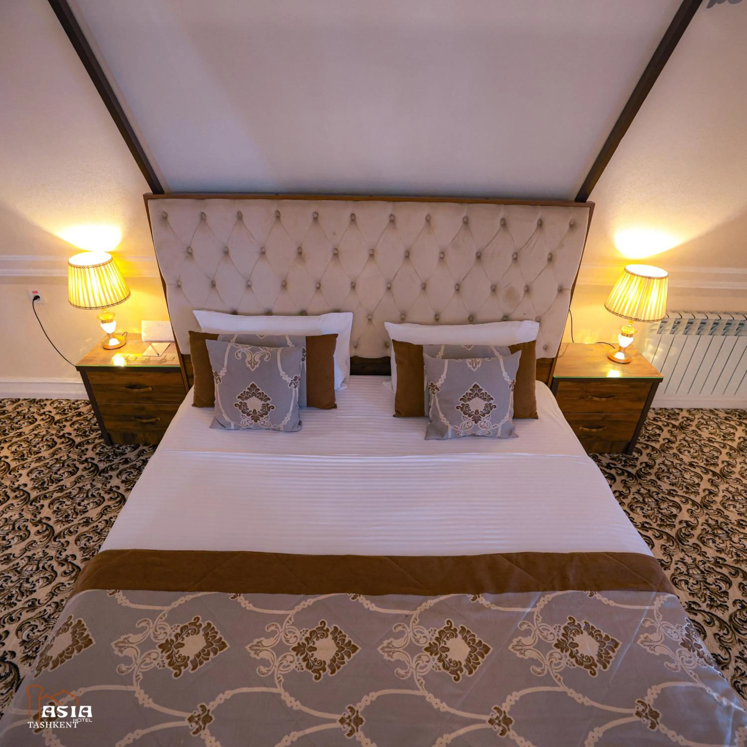 Bed in Asia Tashkent Hotel