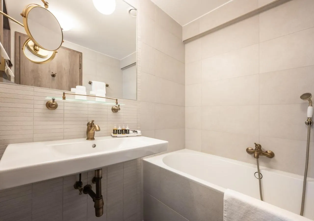 Bathroom in EFI SPA Hotel Superior & Pivovar