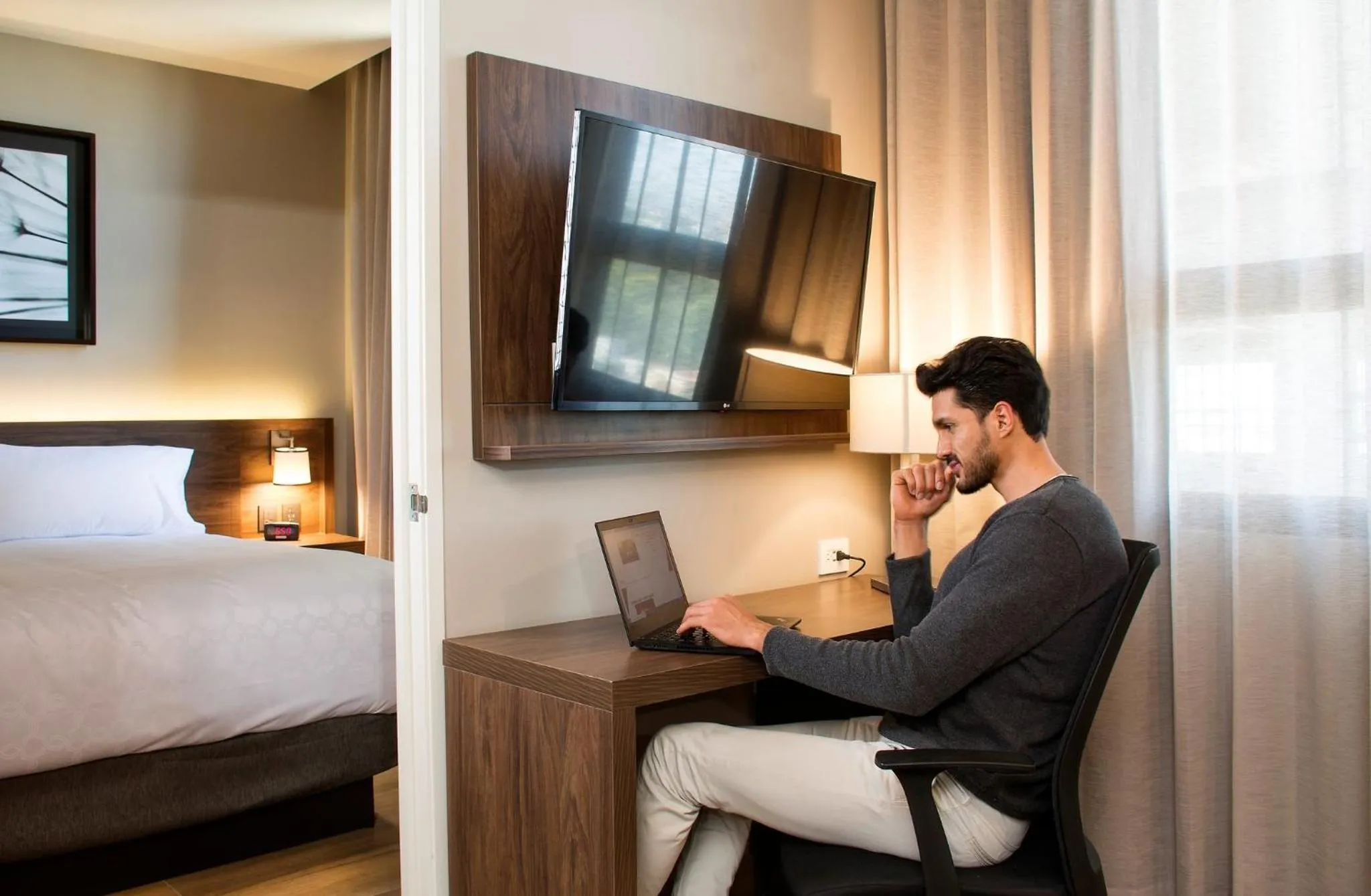 Photo of the whole room, Bed in Staybridge Suites - Guadalajara Novena by IHG