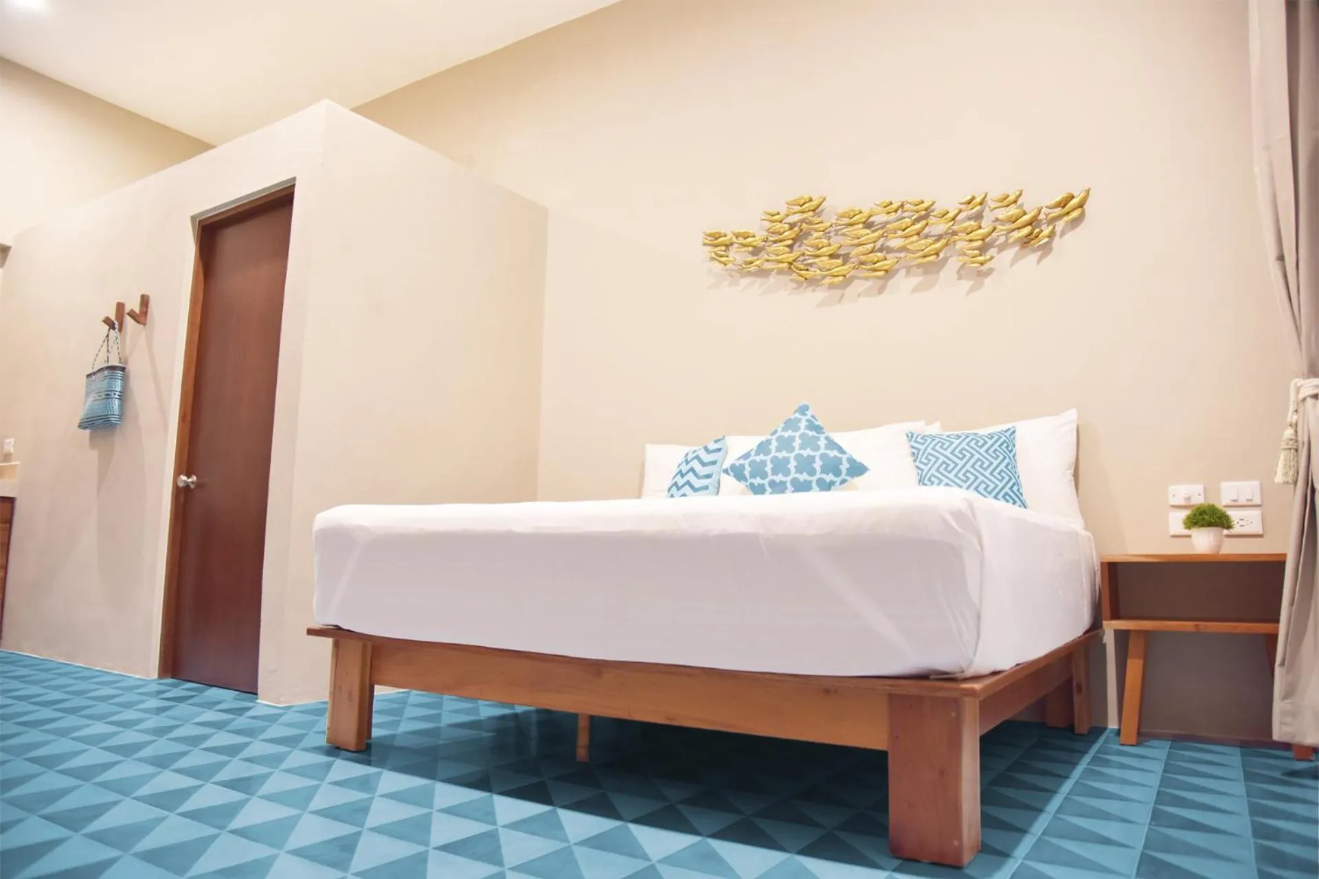 Bed in Noah Beach Hotel & Suites