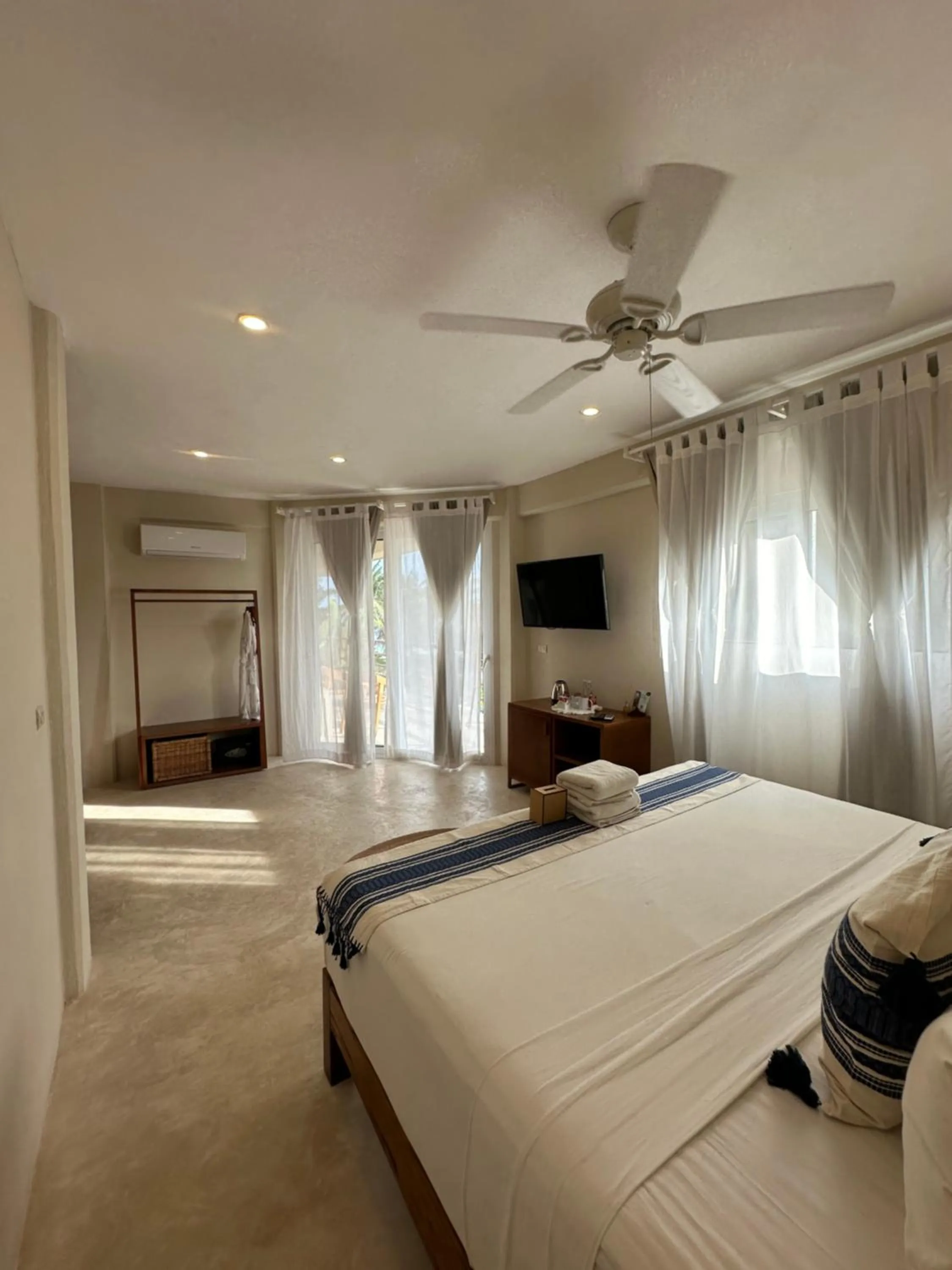 Bed in Noah Beach Hotel & Suites