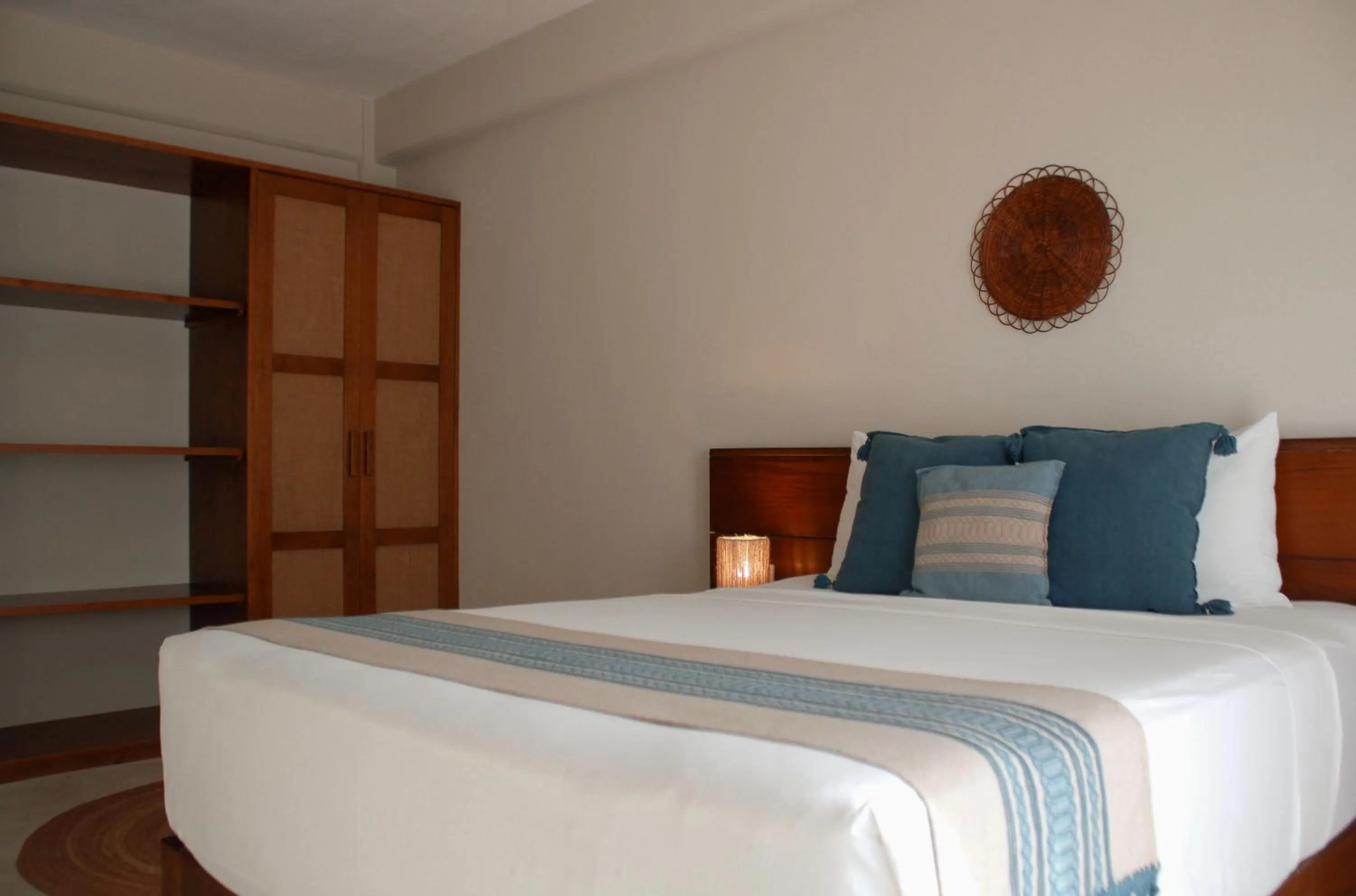 Bed in Noah Beach Hotel & Suites