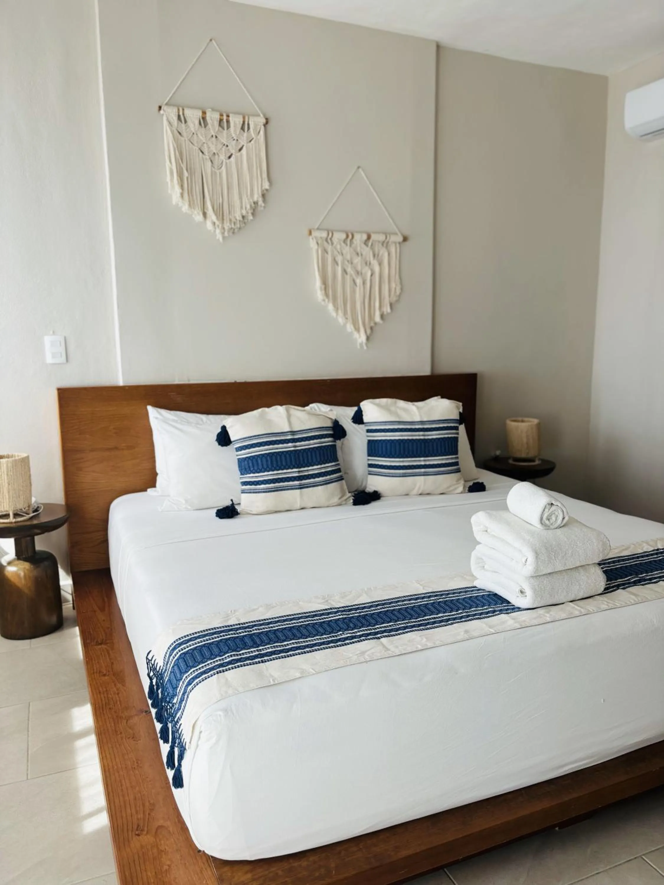 Bed in Noah Beach Hotel & Suites