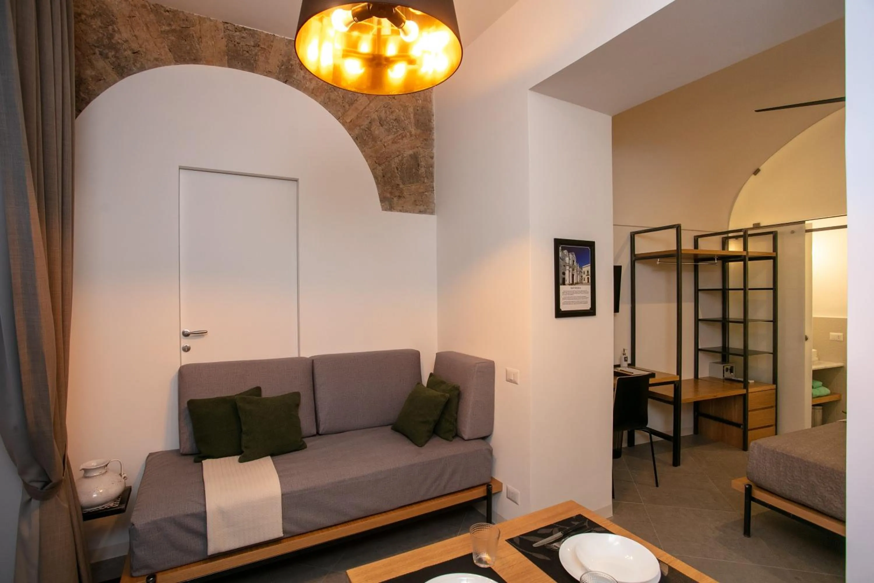 Seating area, Bed in Bellamania B&B