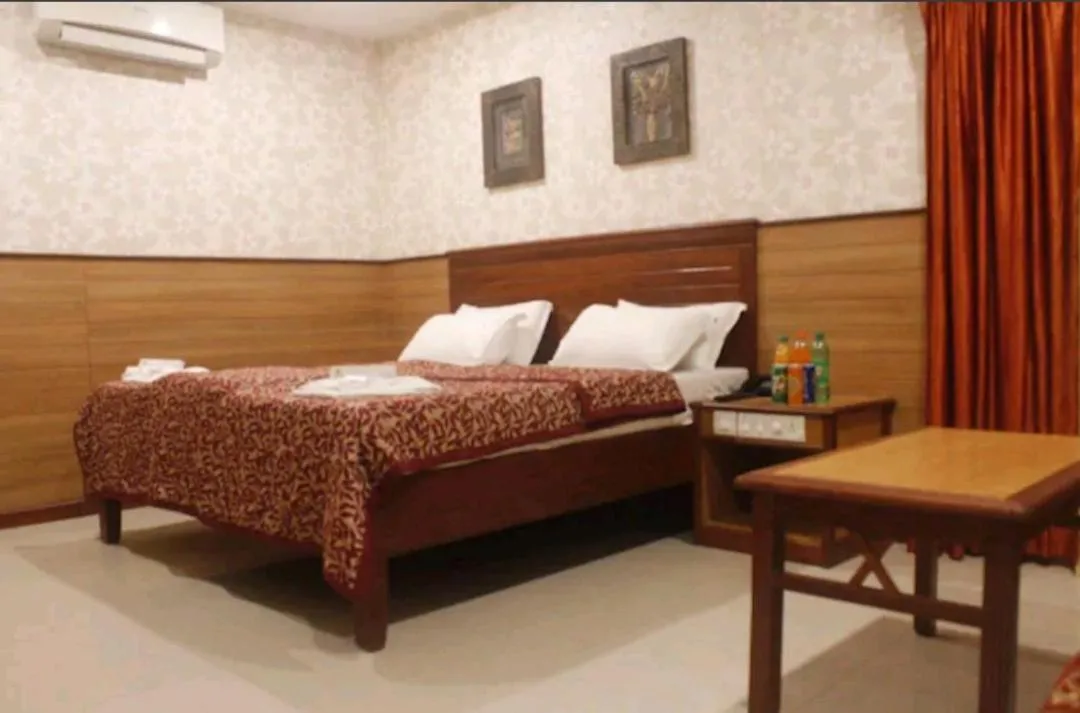 Bed in Hotel Chitra Park