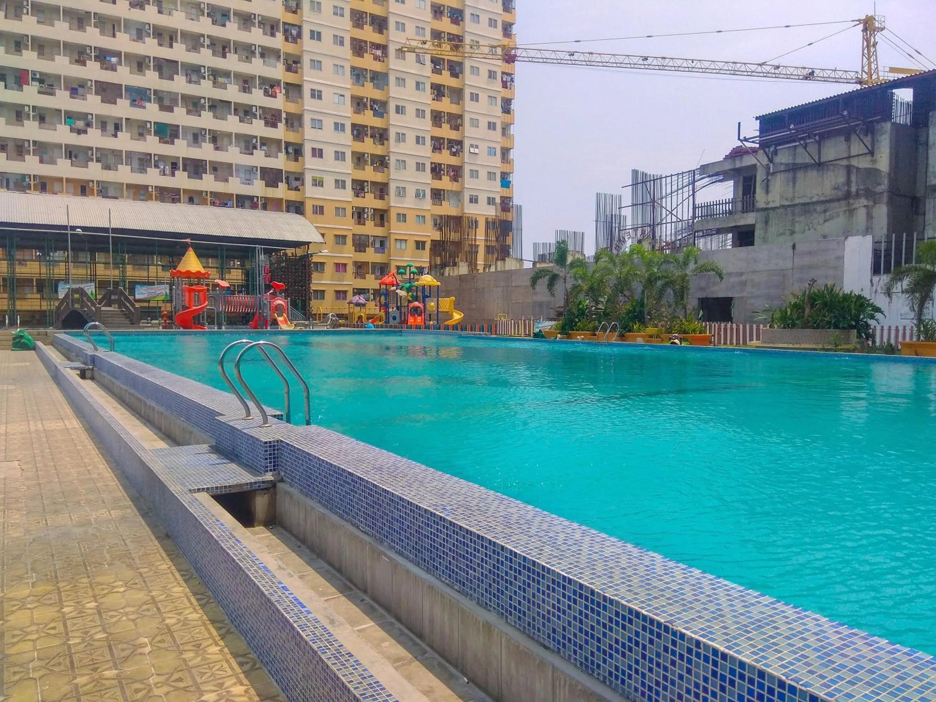 Property building in Cozy with River View @ 2BR Teluk Intan Apartment By Travelio