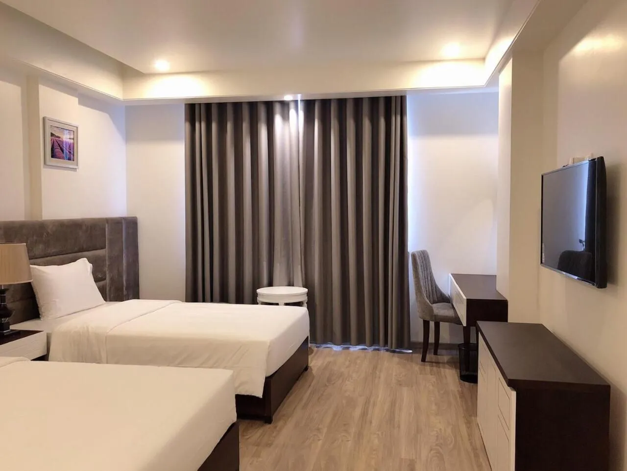 Bed in Lotus Hotel & Apartment