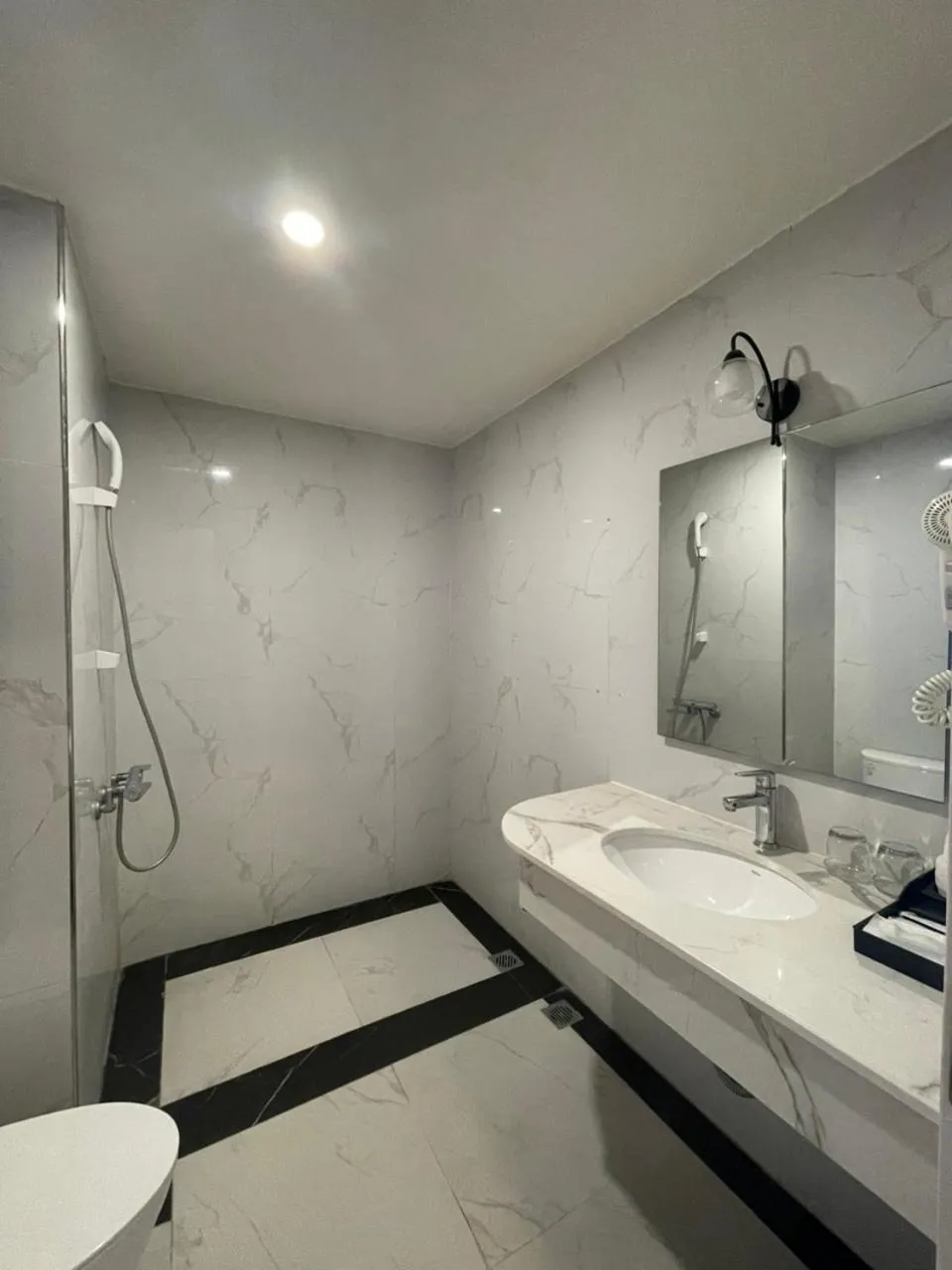 Bathroom in Lotus Hotel & Apartment