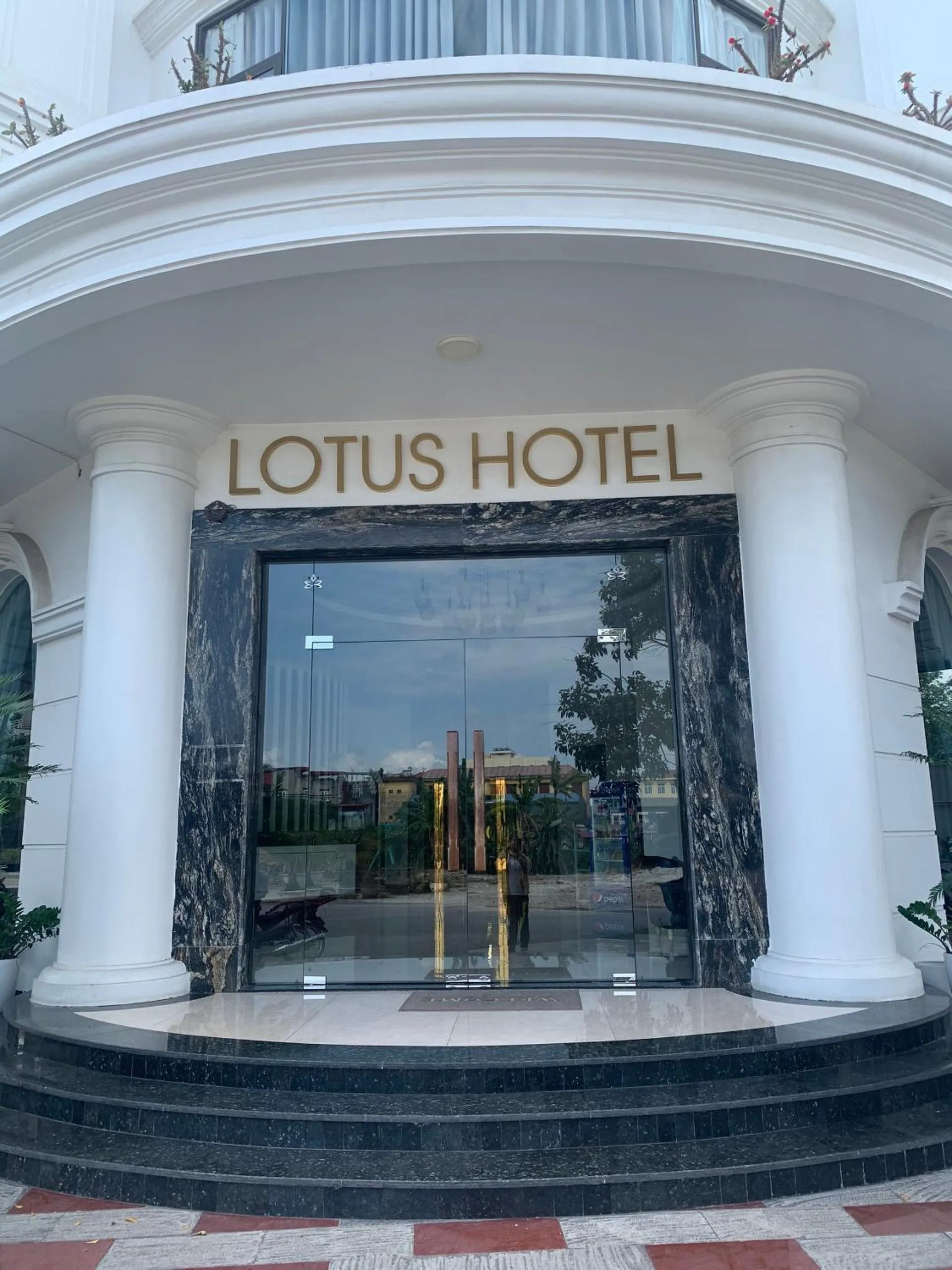 Property building in Lotus Hotel & Apartment