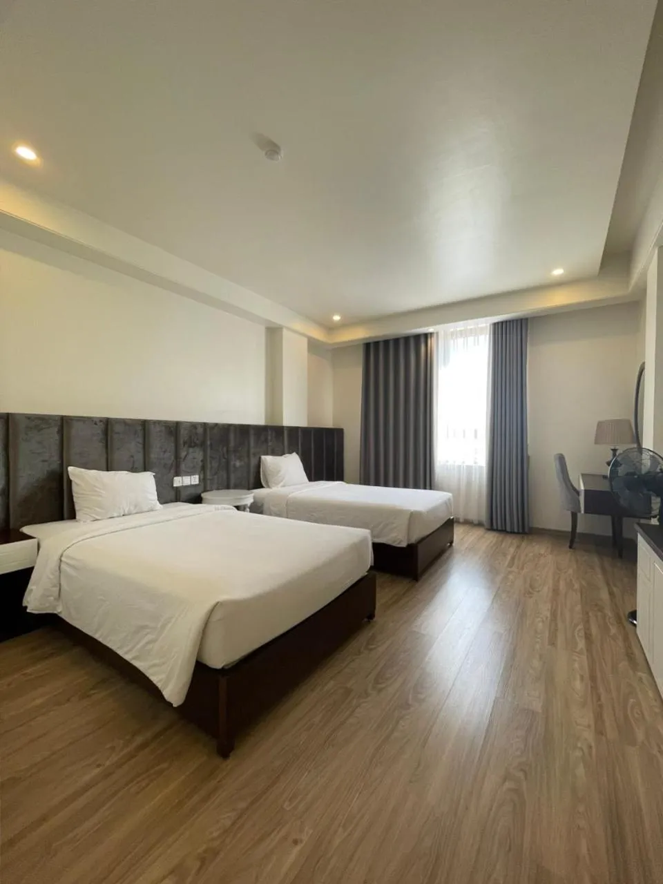 Bed in Lotus Hotel & Apartment