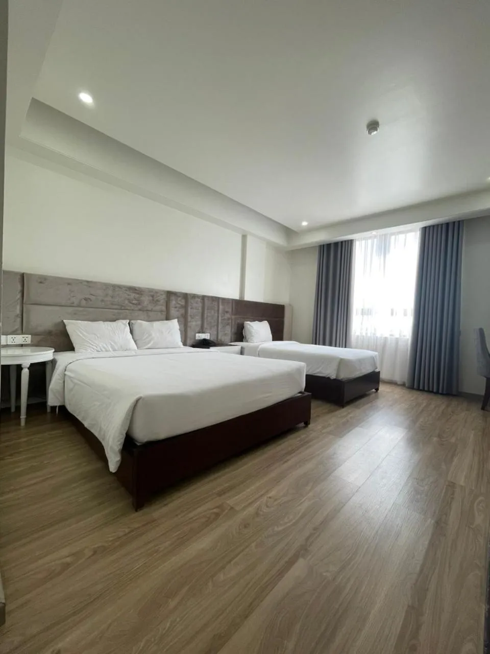 Bed in Lotus Hotel & Apartment