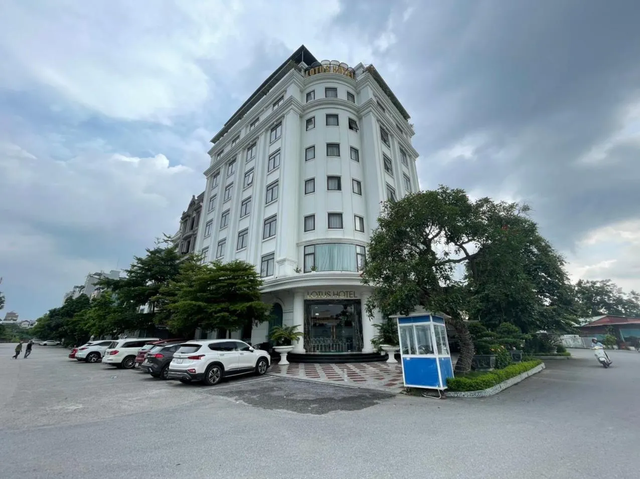 Property building in Lotus Hotel & Apartment