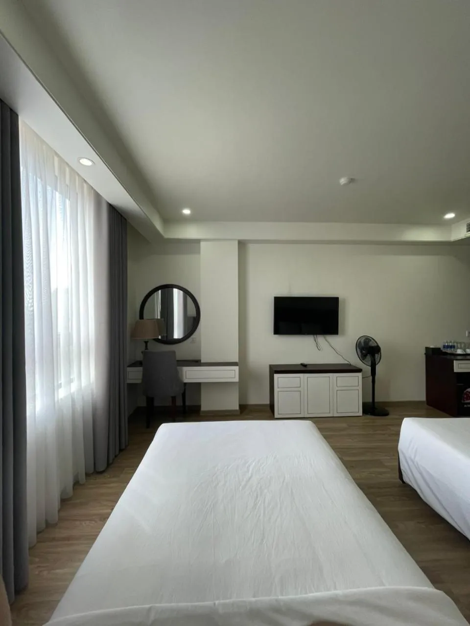Bed in Lotus Hotel & Apartment