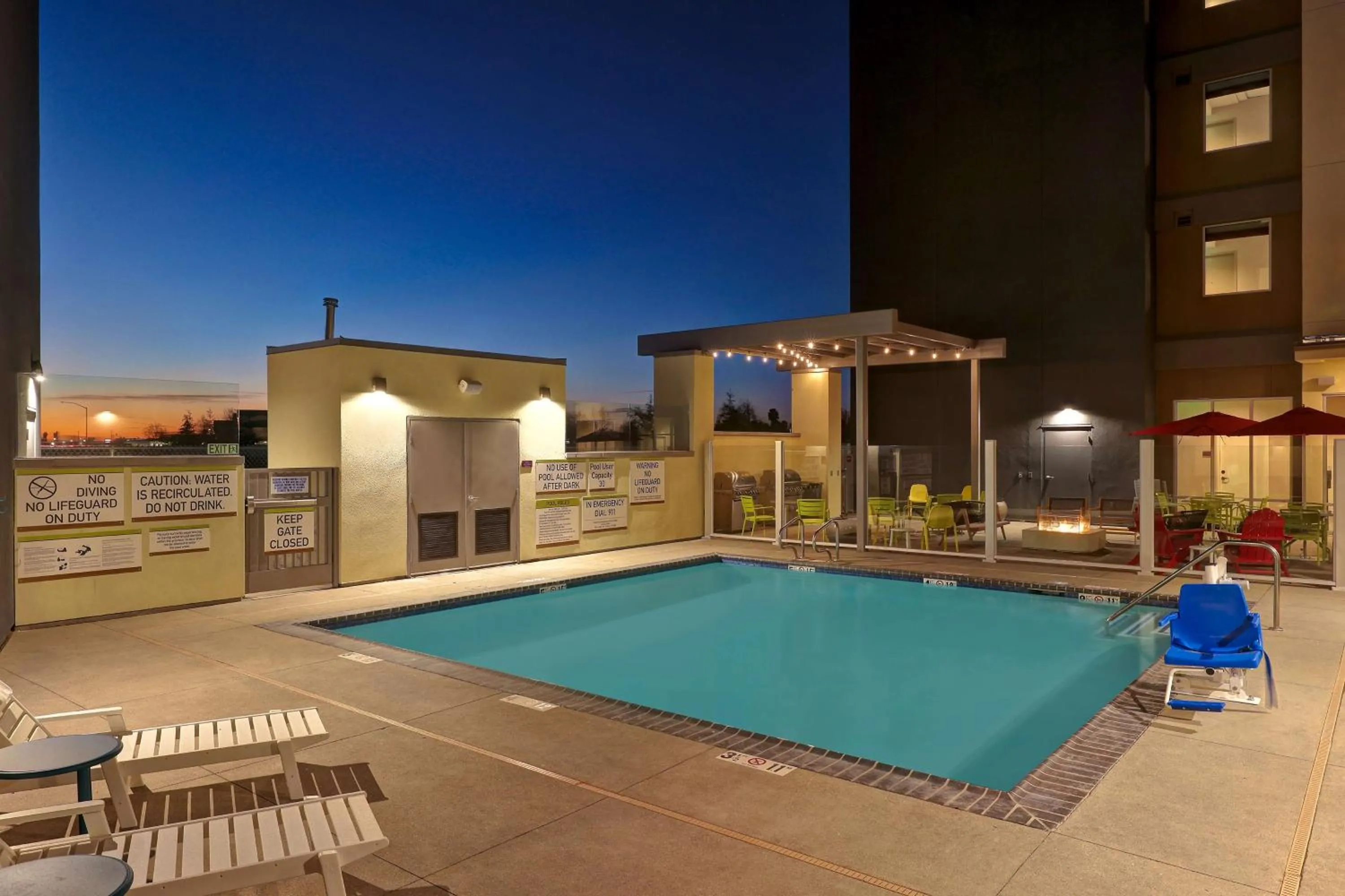 Pool view in Home2 Suites By Hilton Turlock, Ca