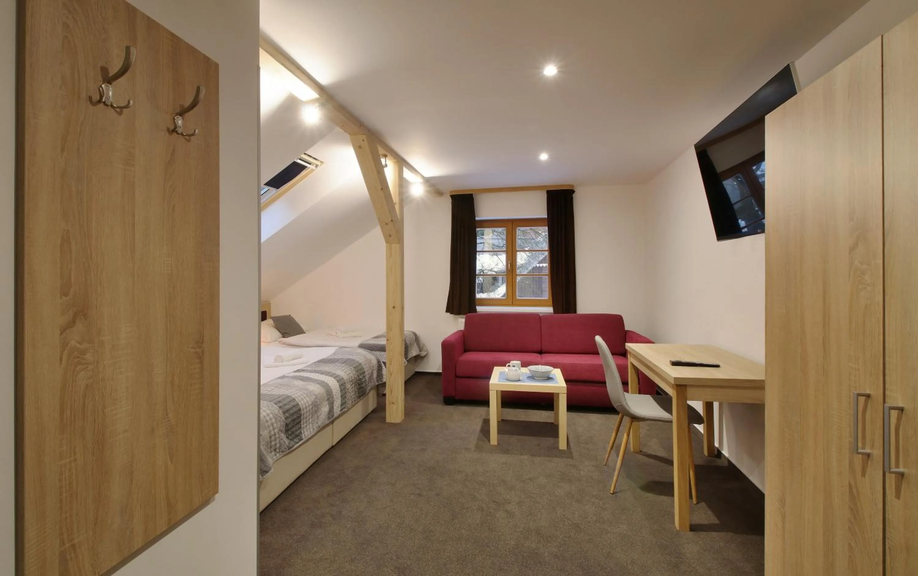 Living room, Bed in Hotel Hvezda