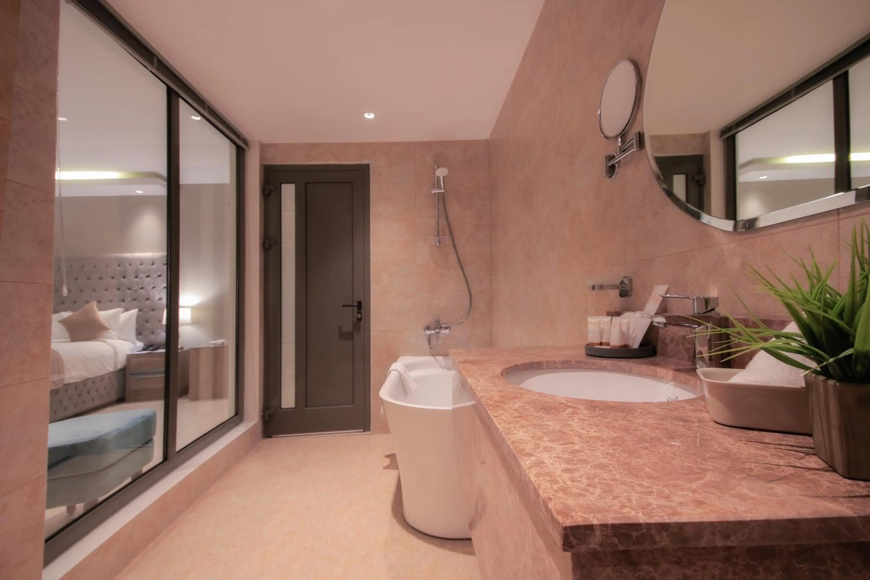 Bathroom, Bed in The Address Palace Apartments