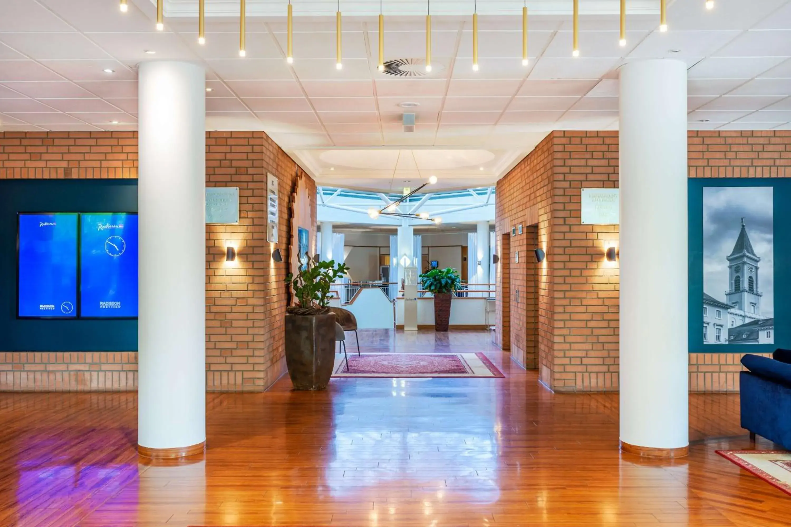 Lobby or reception in Radisson Blu Hotel Karlsruhe Lobby or reception in Radisson Blu Hotel Karlsruhe