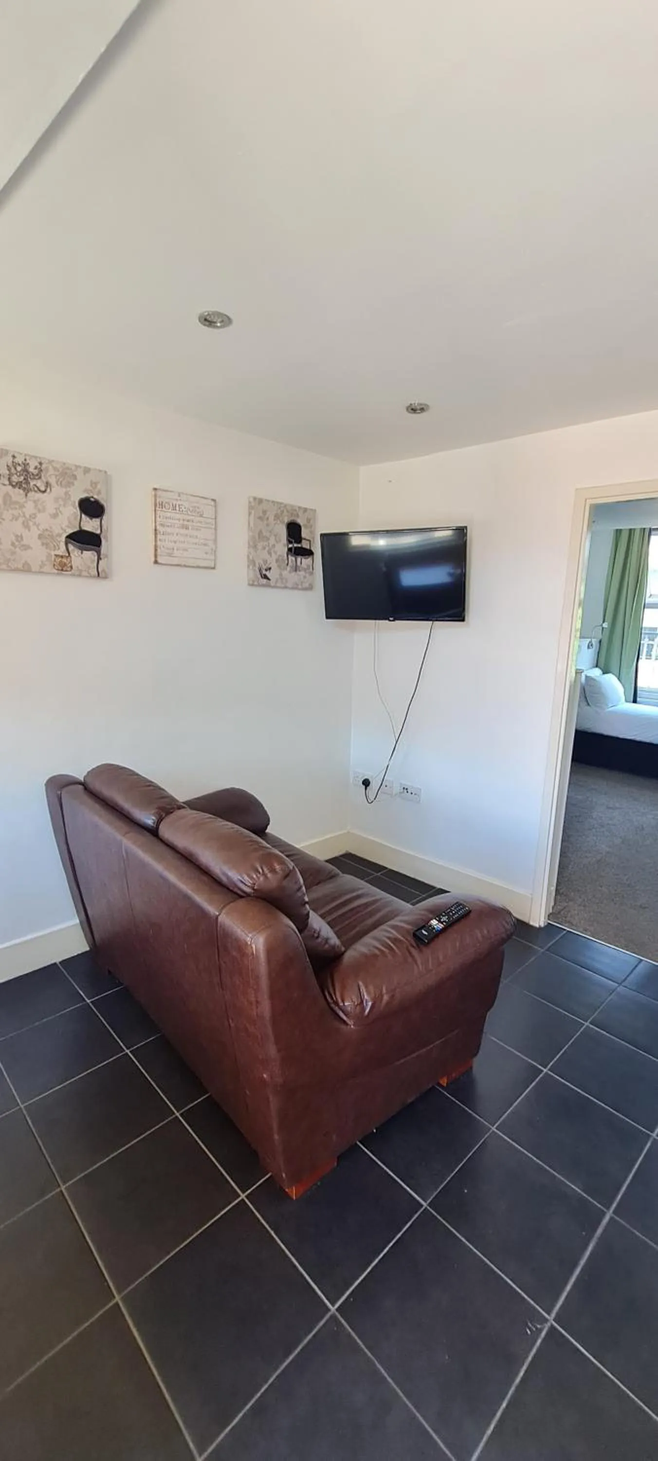 Kitchen or kitchenette in H.V Apartments