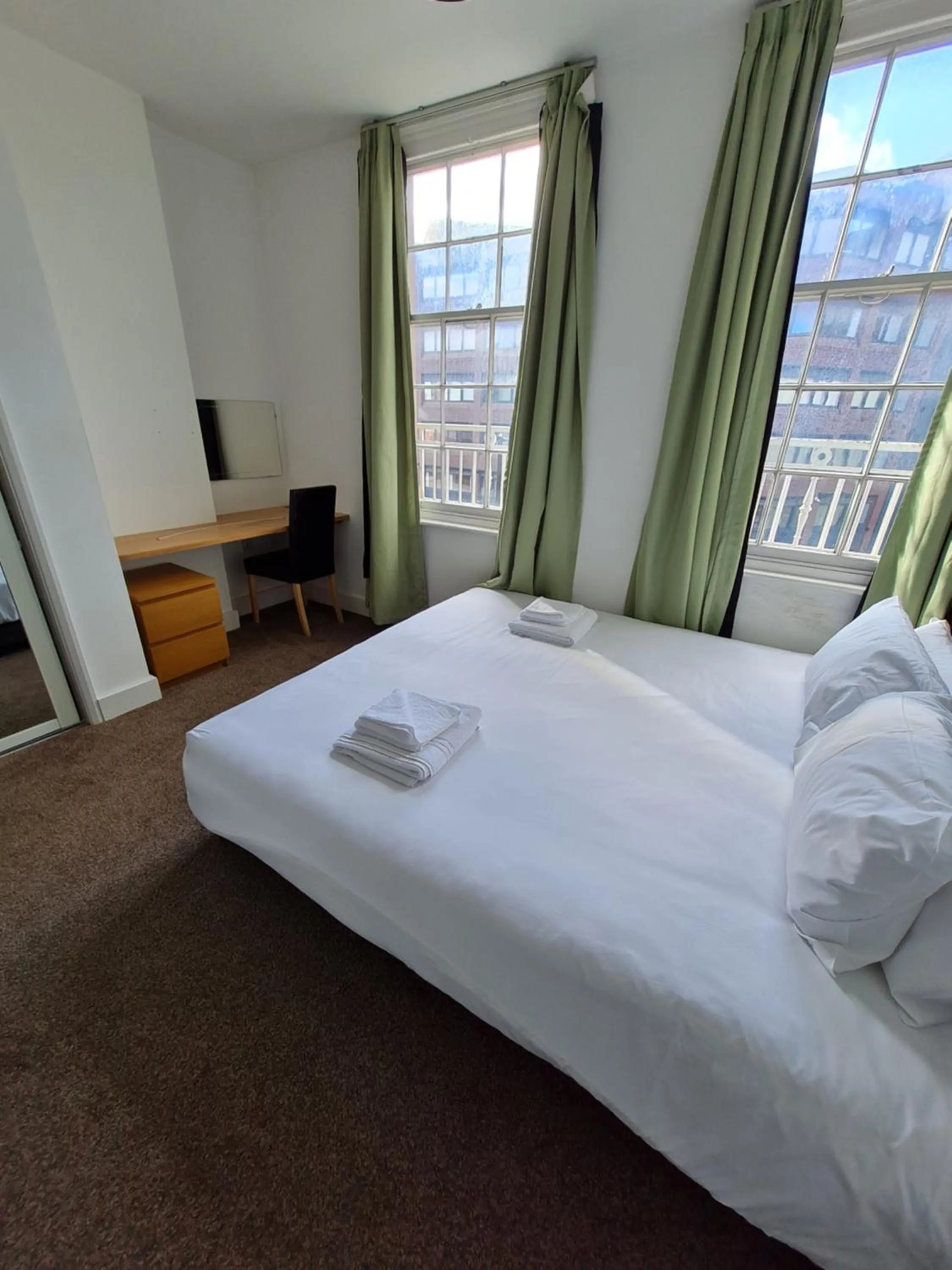 Bedroom in H.V Apartments