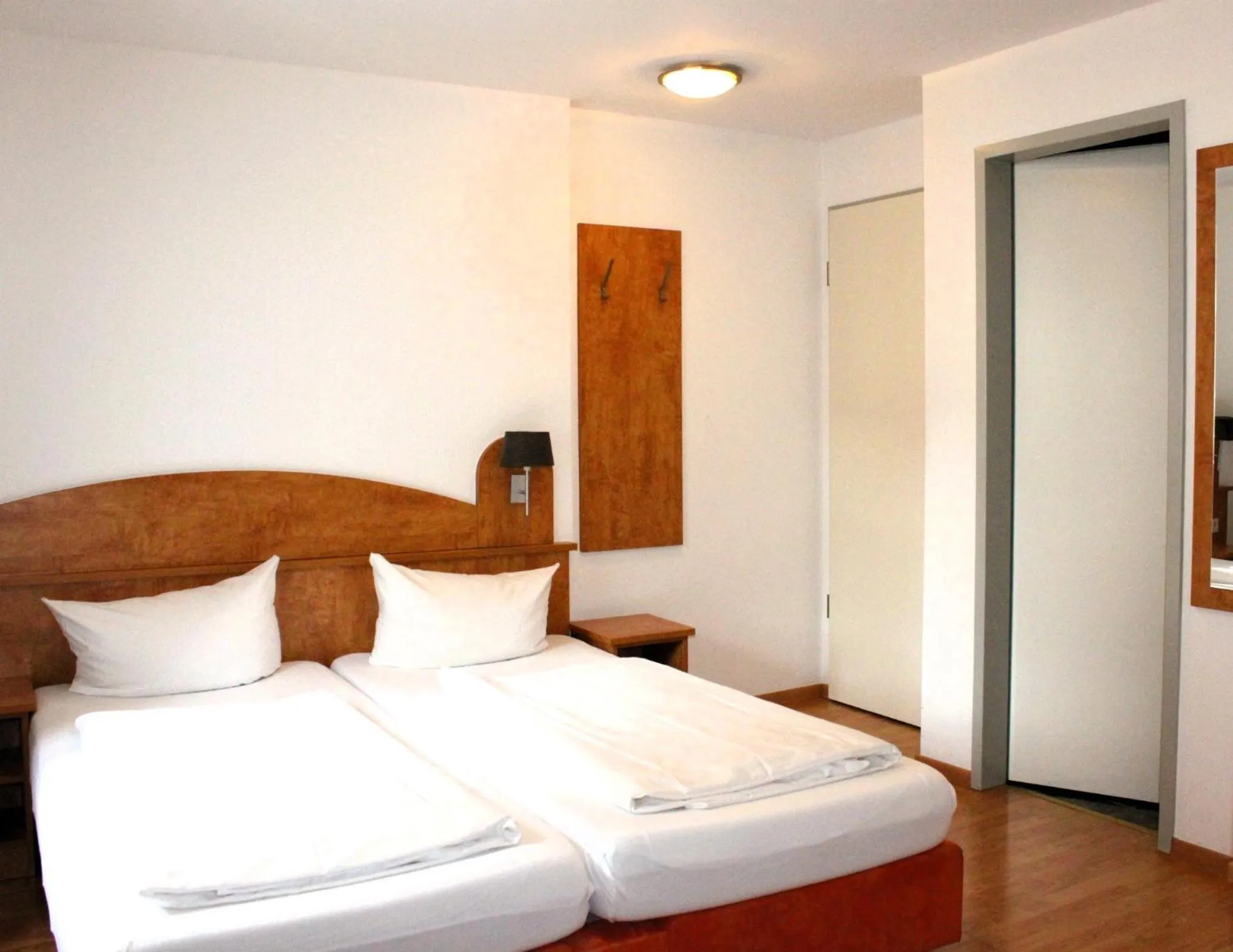 Bed in Hotel Waitzingers