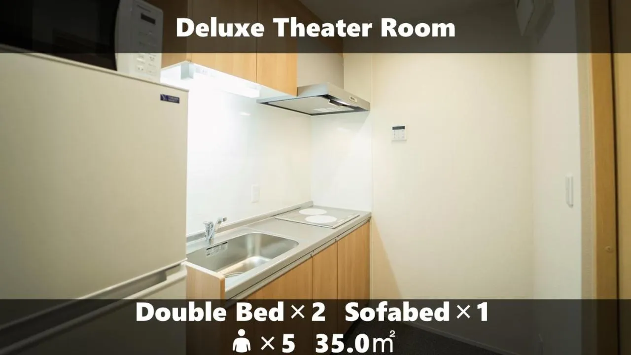 Kitchen or kitchenette in Vieuno Stay Hakata 1