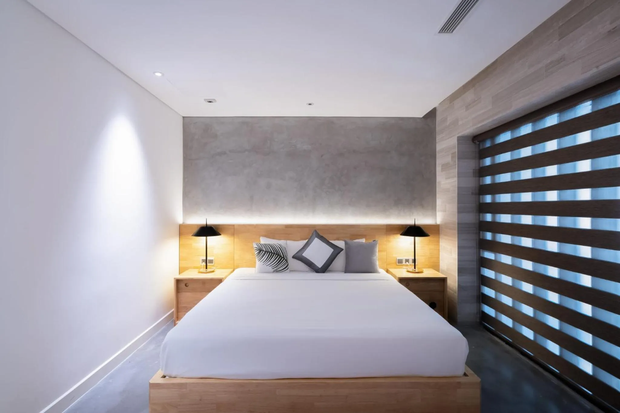 Bed in Bi Eco Suites Hanoi
