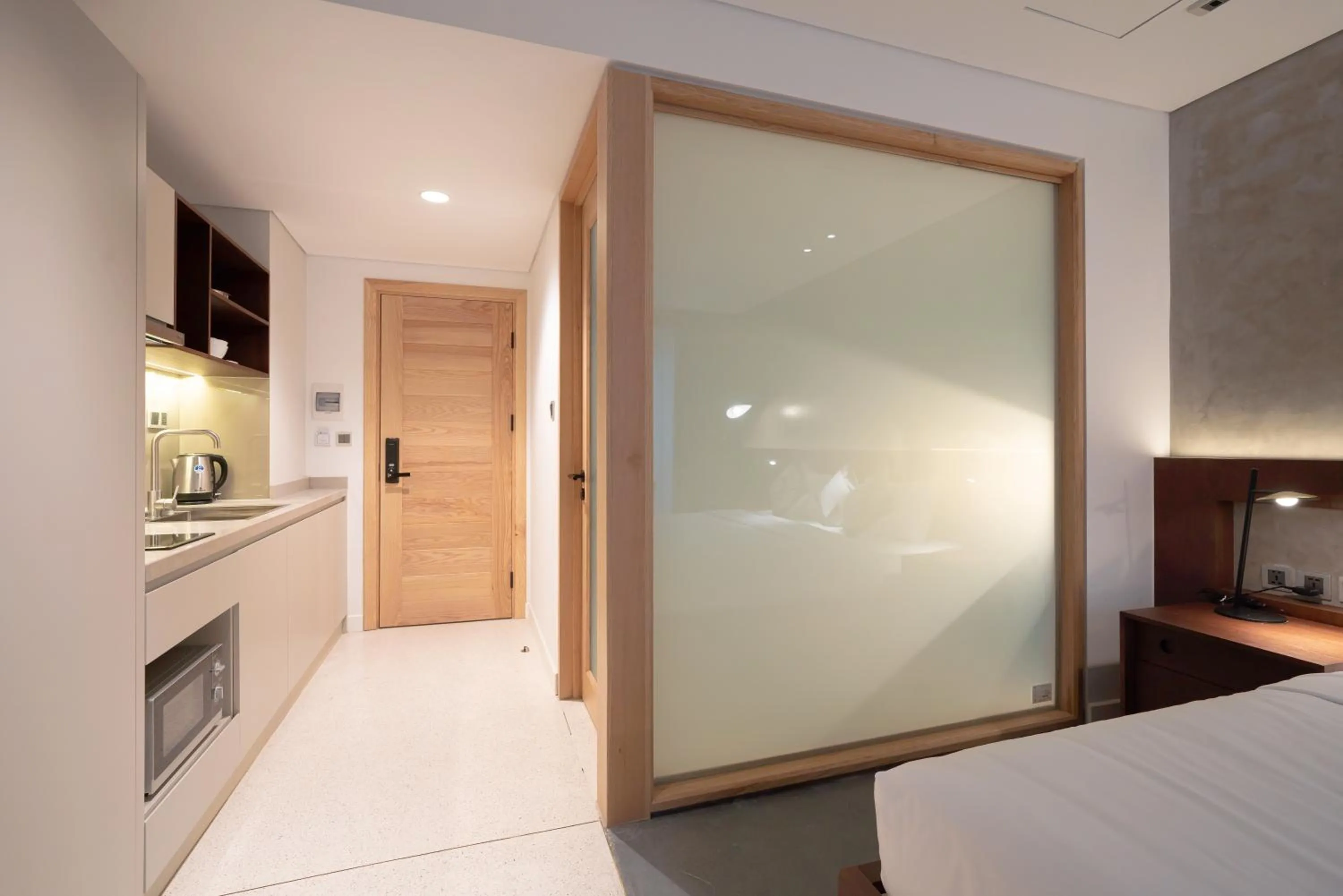 Bed in Bi Eco Suites Hanoi