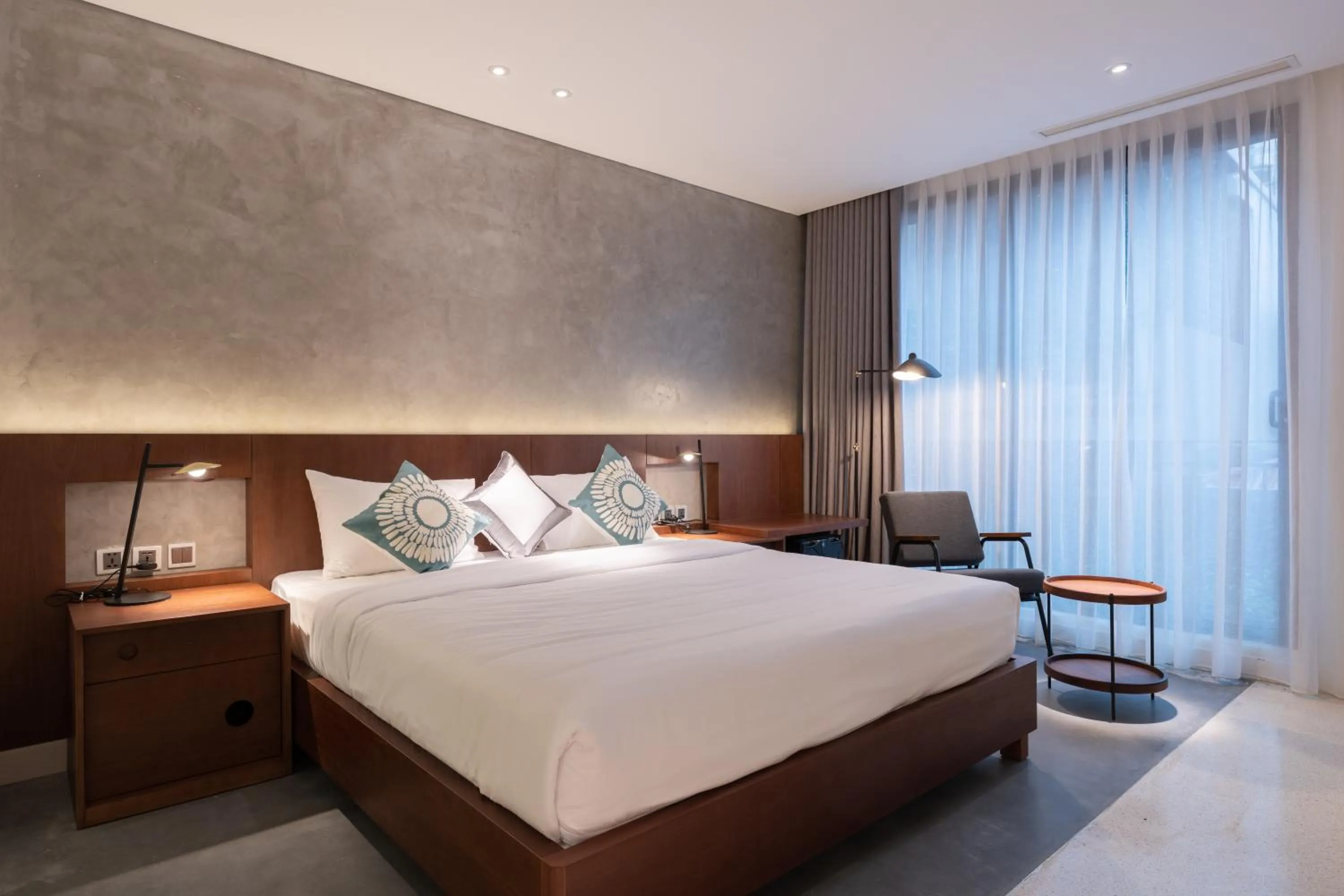 Bed in Bi Eco Suites Hanoi