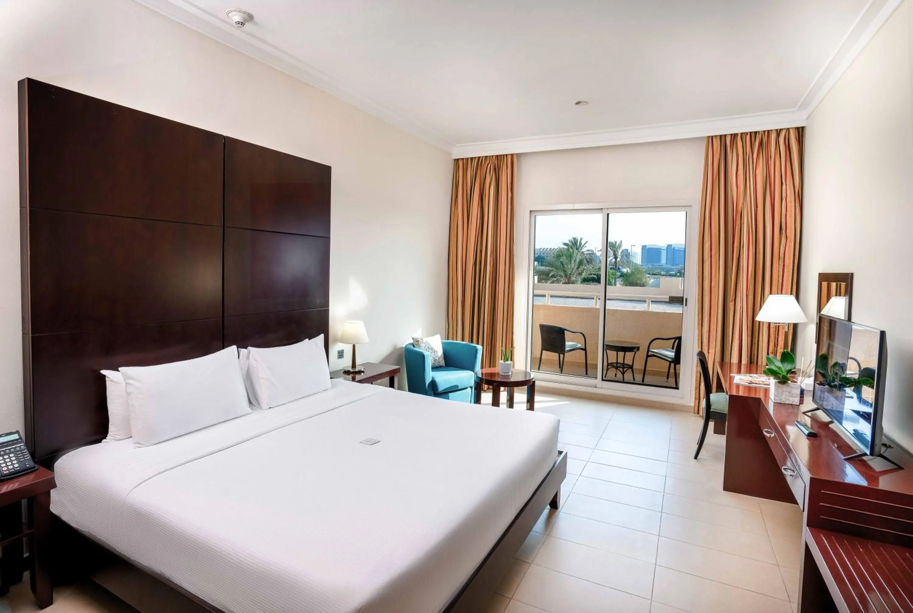 Bed in Metropolitan Al Mafraq Hotel