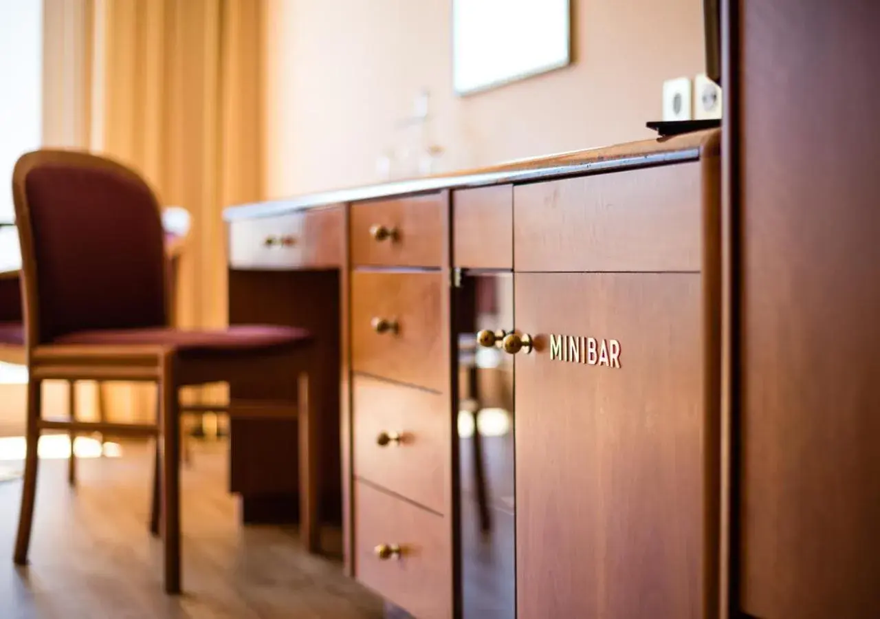 Bedroom in Hôtel des Bains de Saillon Bedroom in Hôtel des Bains de Saillon