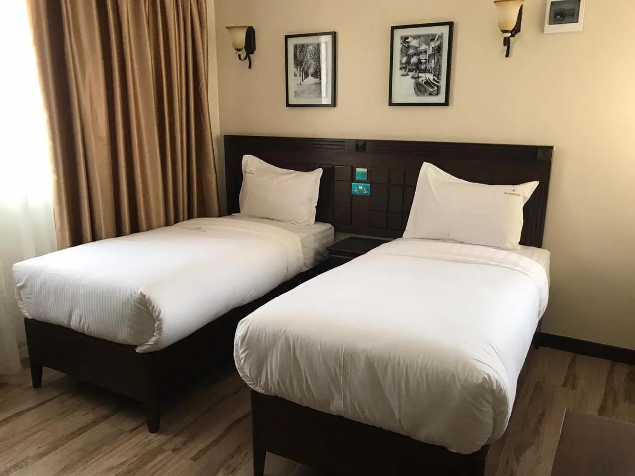Bed in Hemak Suites