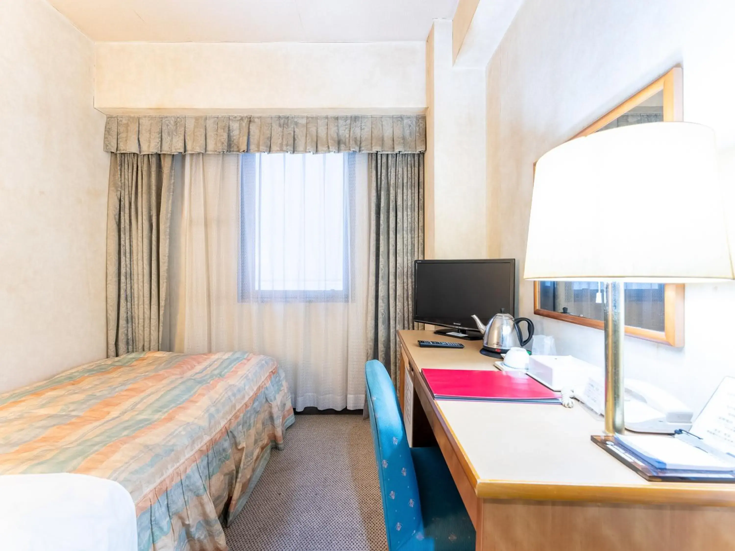 Bed in Tabist Hotel Mercury Asakusabashi Bed in Tabist Hotel Mercury Asakusabashi