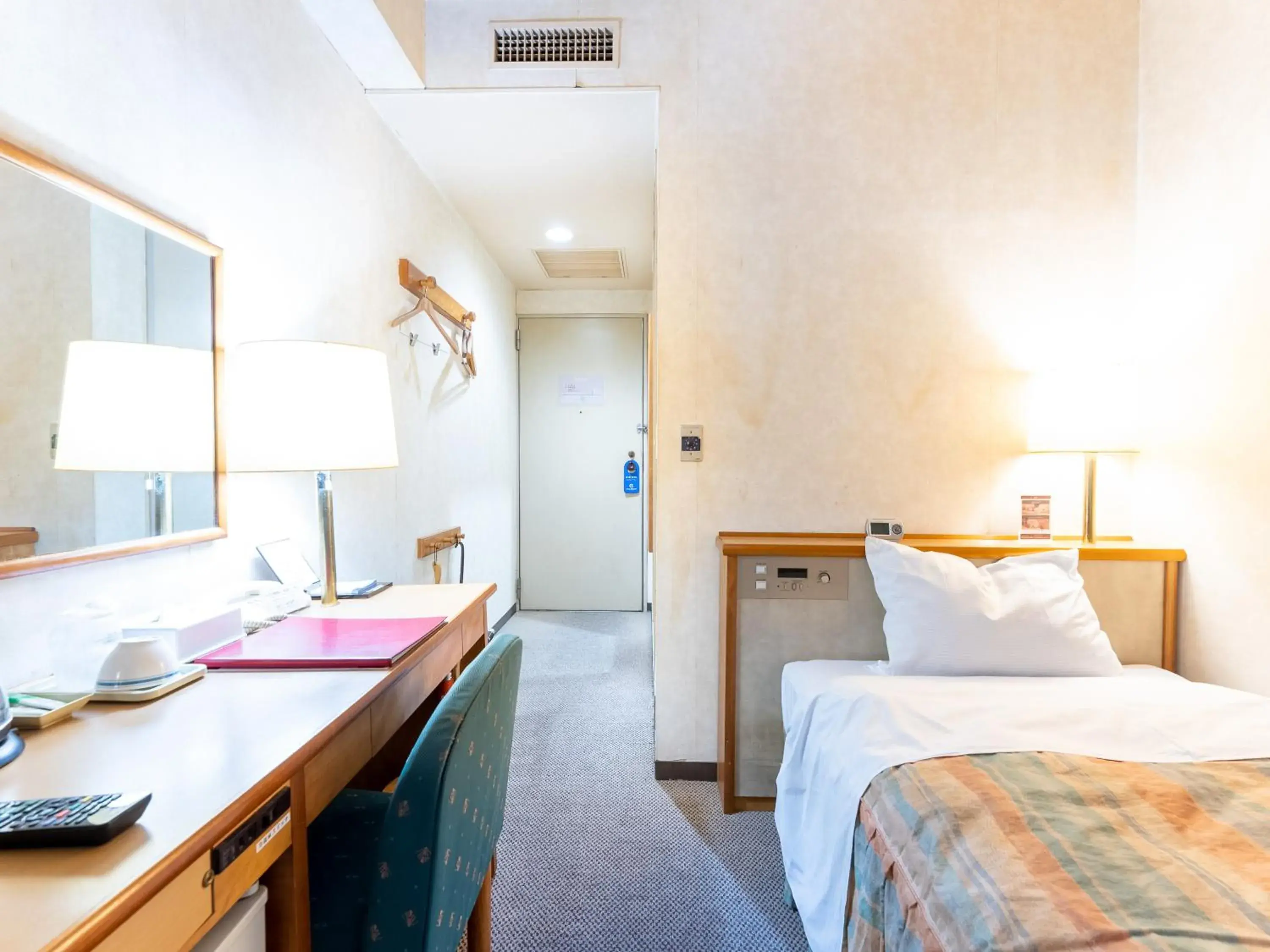 Bed in Tabist Hotel Mercury Asakusabashi Bed in Tabist Hotel Mercury Asakusabashi