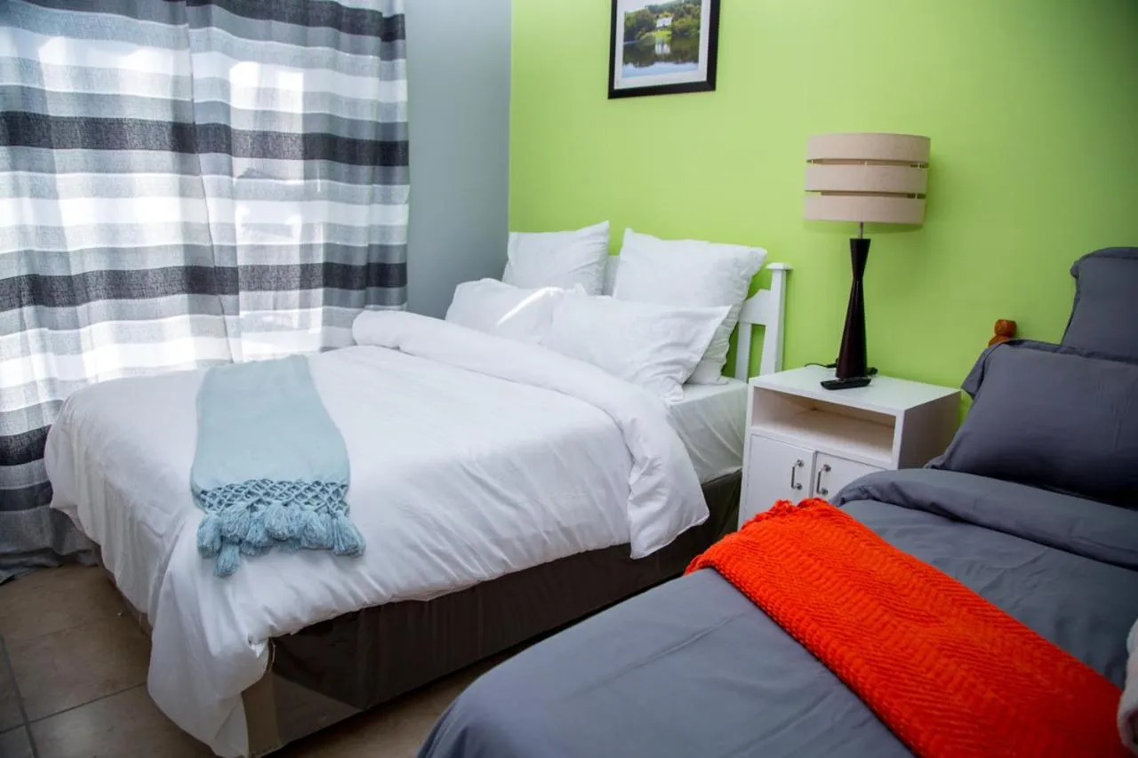 Bed in Relaxing Guest House in th Heart of Ndabeni