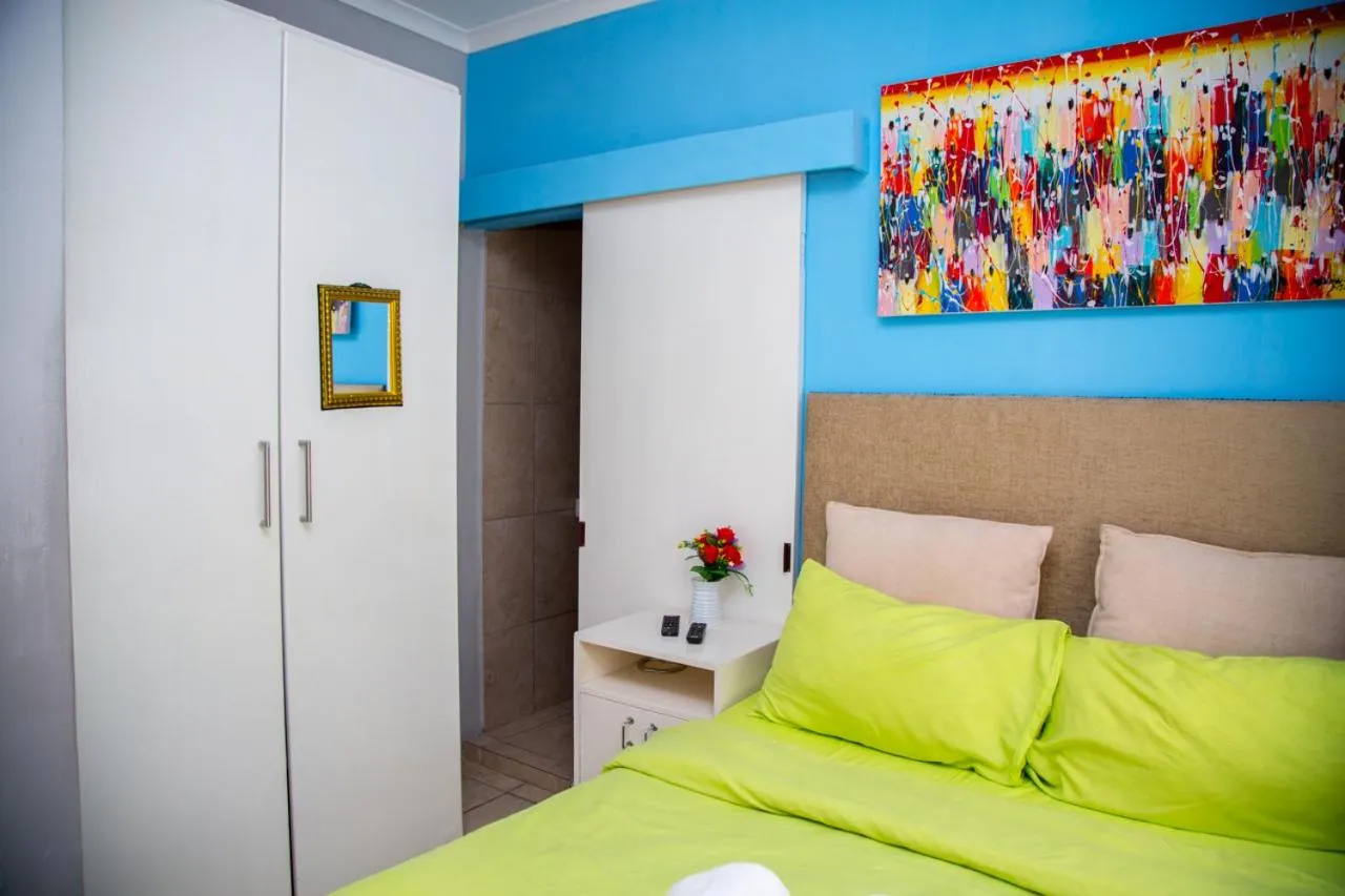 Bed in Relaxing Guest House in th Heart of Ndabeni