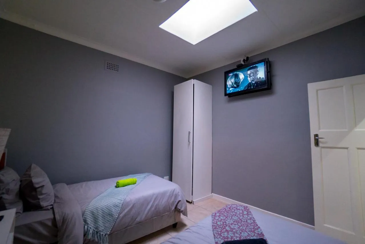 Bed in Relaxing Guest House in th Heart of Ndabeni