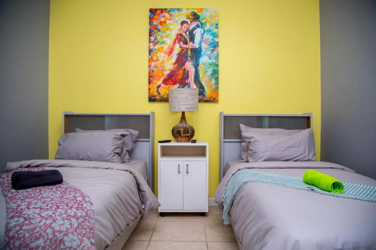 Bed in Relaxing Guest House in th Heart of Ndabeni