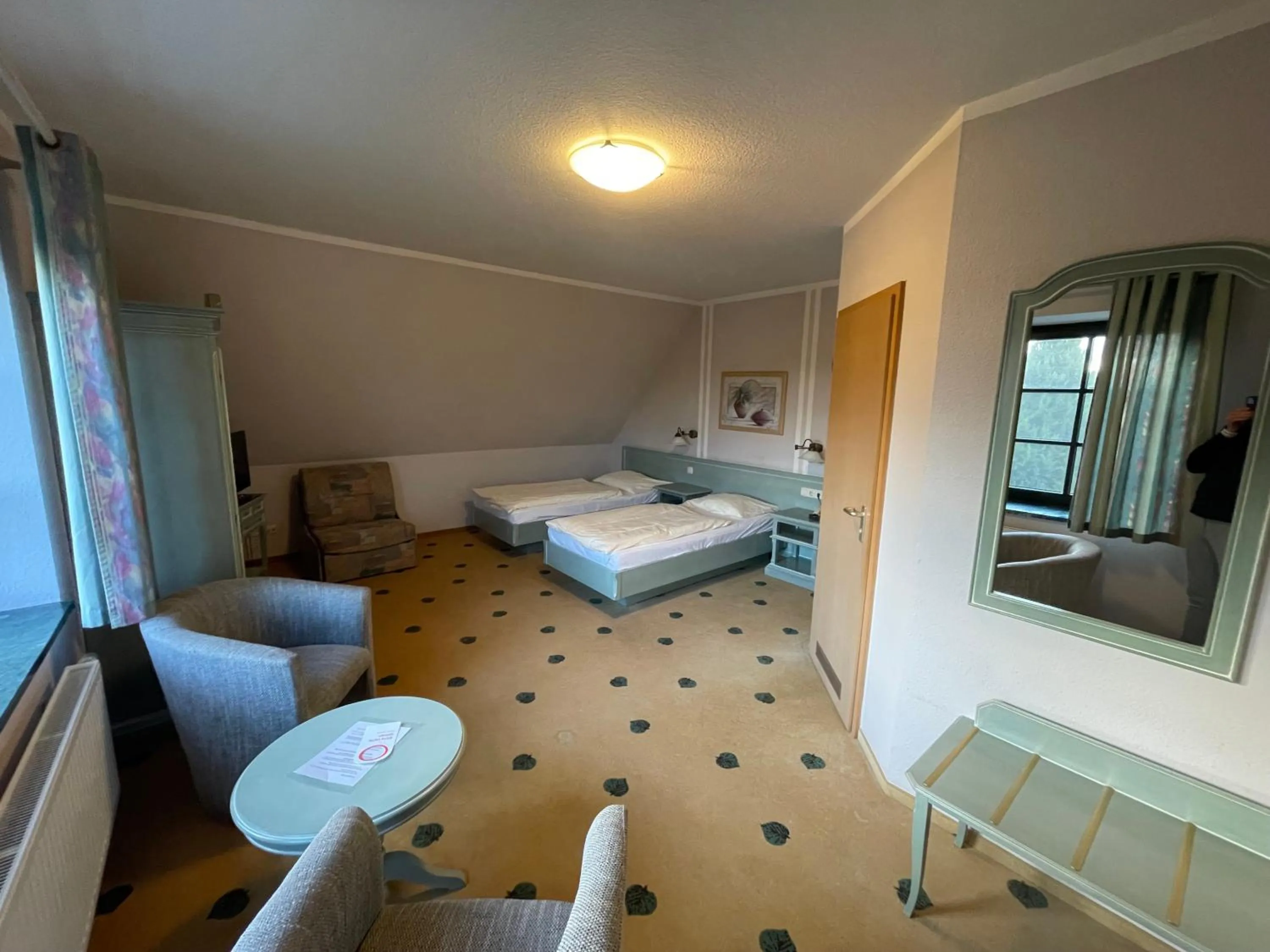 Photo of the whole room, Bed in Müritz Landhotel Grüner Baum