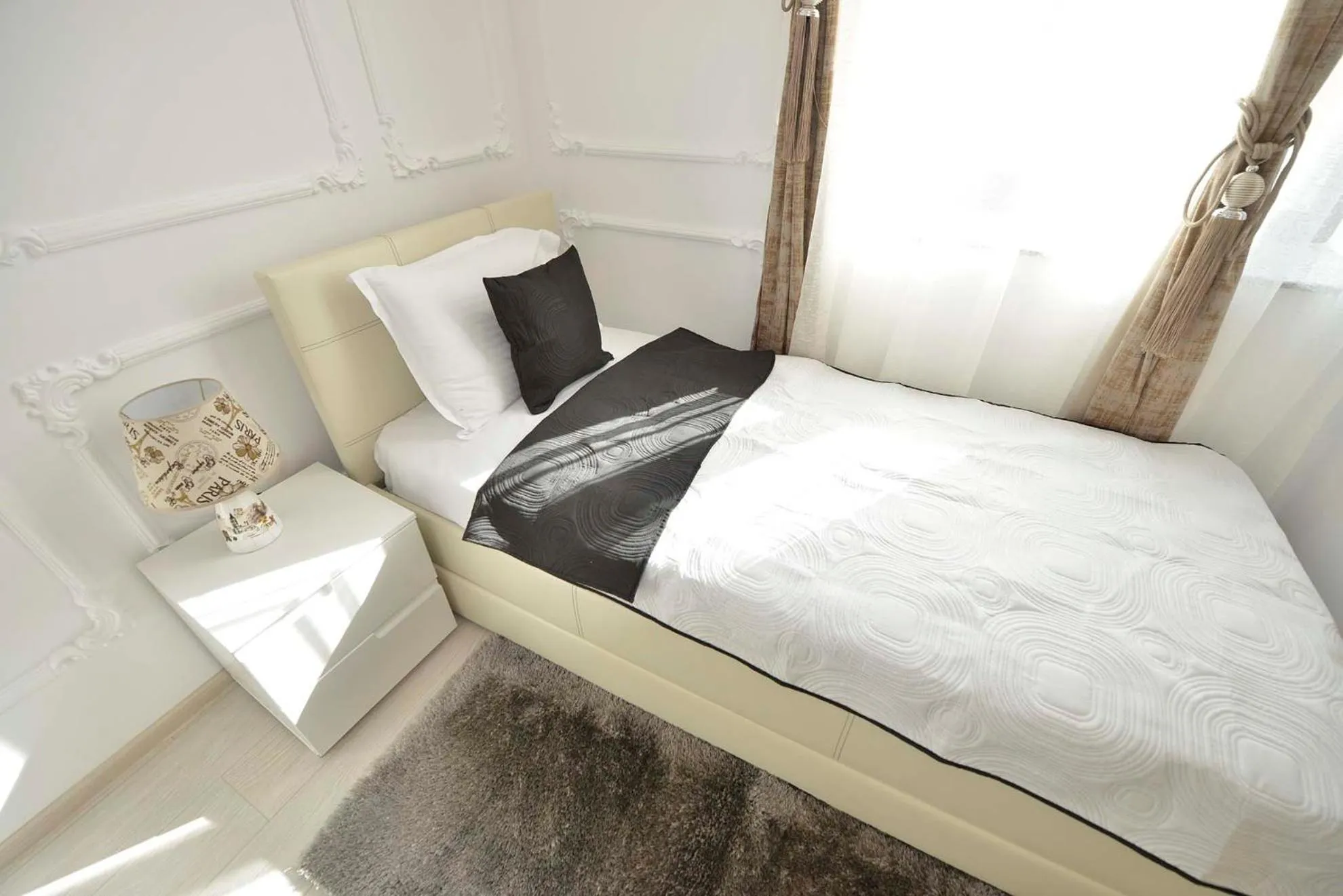 Bed in AMADEUS RESIDENCE
