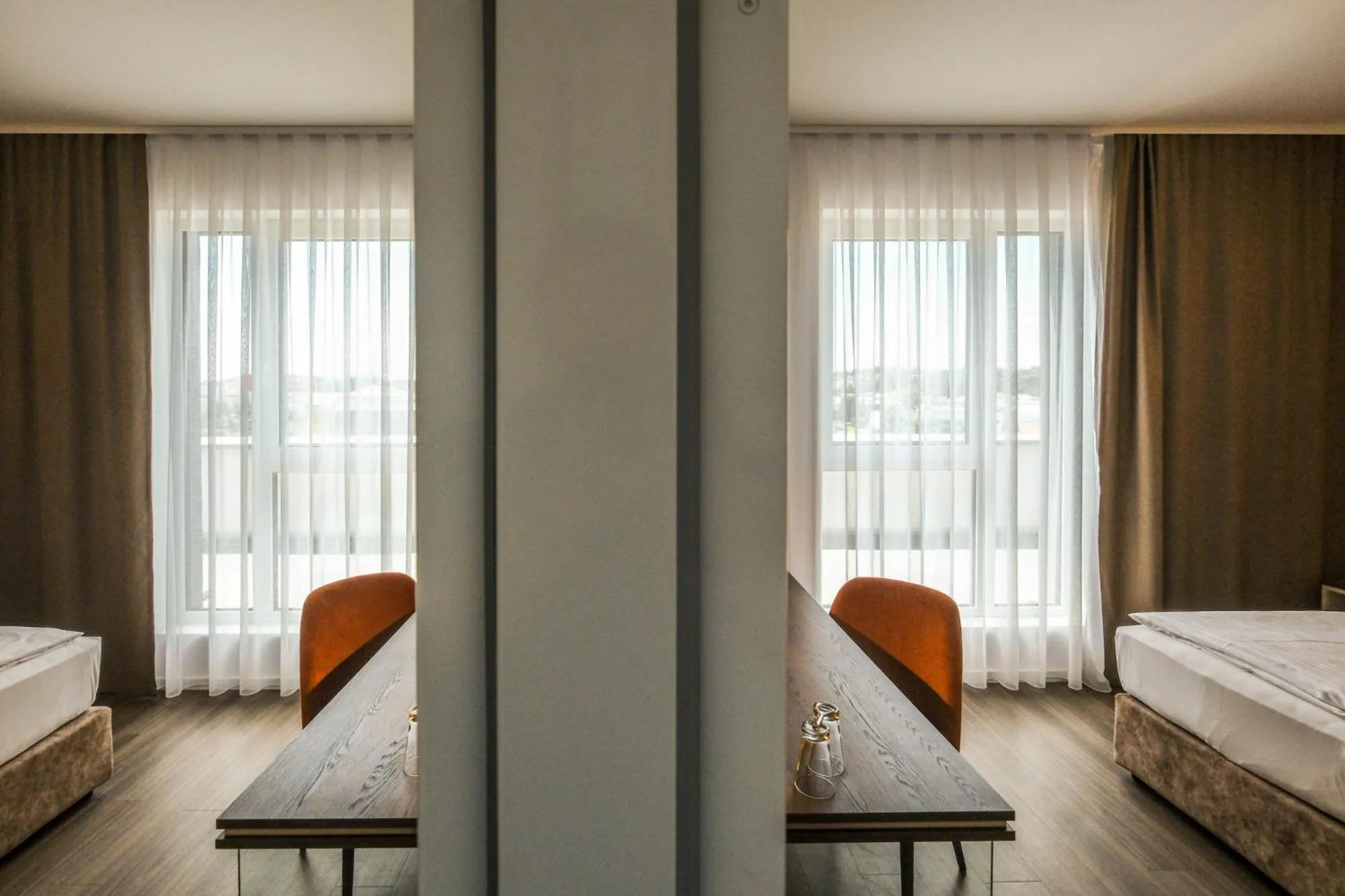 Photo of the whole room, Bed in Tools Hotel Laichingen