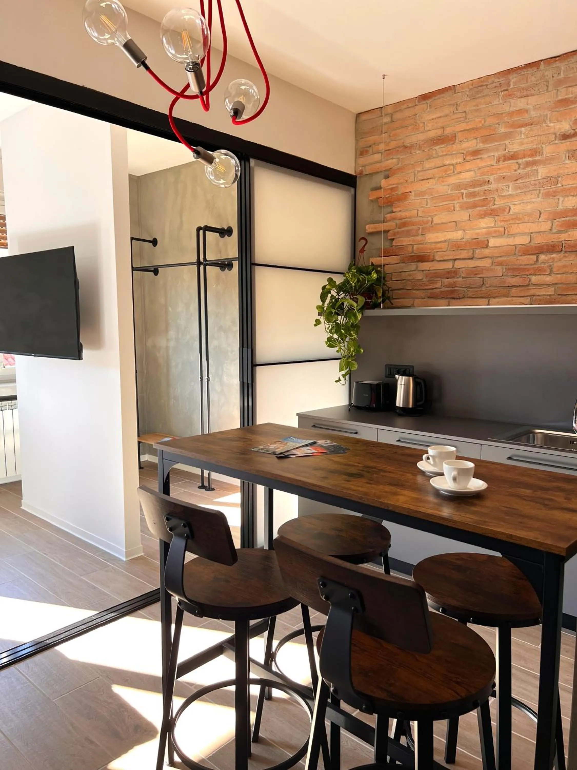 Kitchen or kitchenette in Hotello Trieste