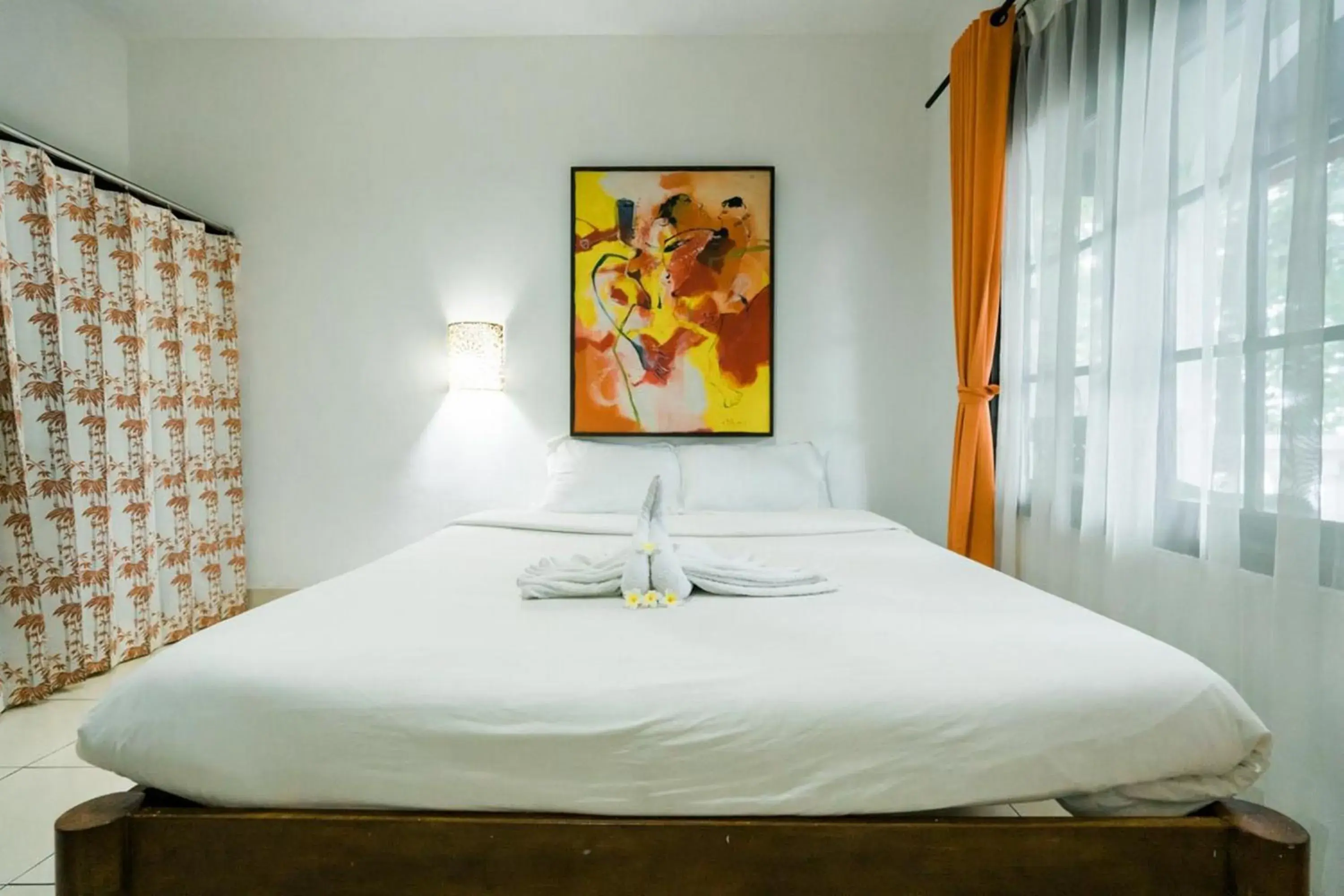 Bed in Urbanview Hotel Ananda Beach Sanur Bed in Urbanview Hotel Ananda Beach Sanur