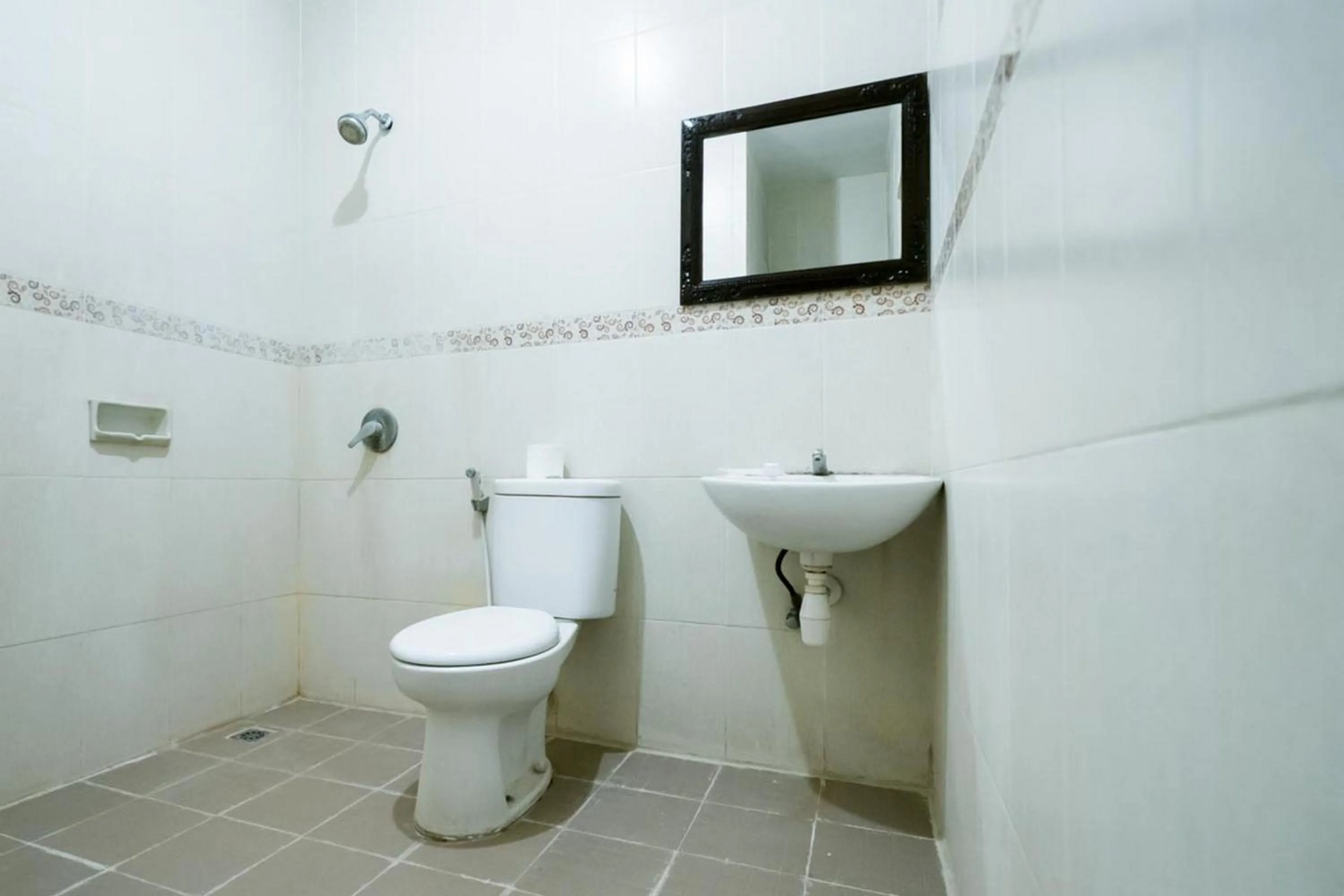Toilet in Urbanview Hotel Ananda Beach Sanur