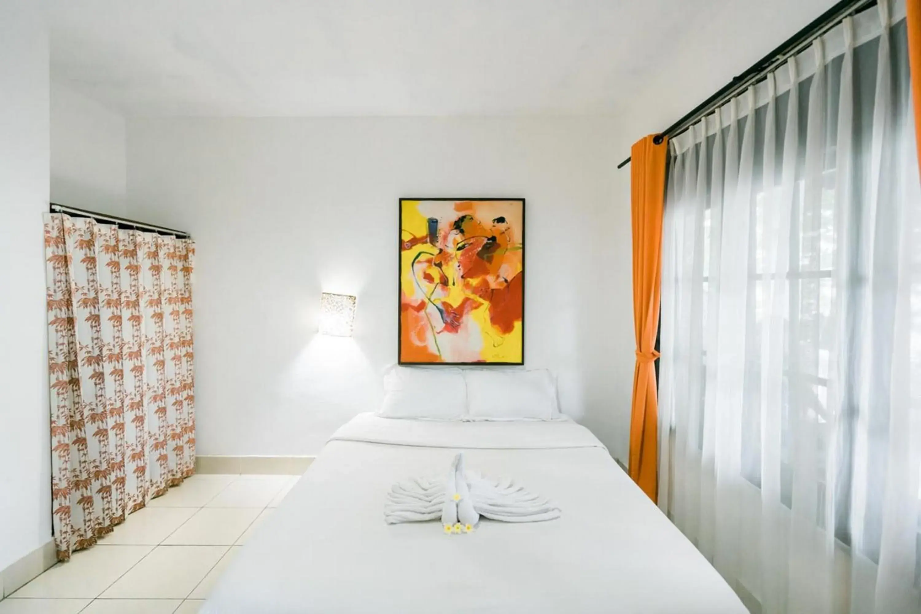 Bed in Urbanview Hotel Ananda Beach Sanur Bed in Urbanview Hotel Ananda Beach Sanur