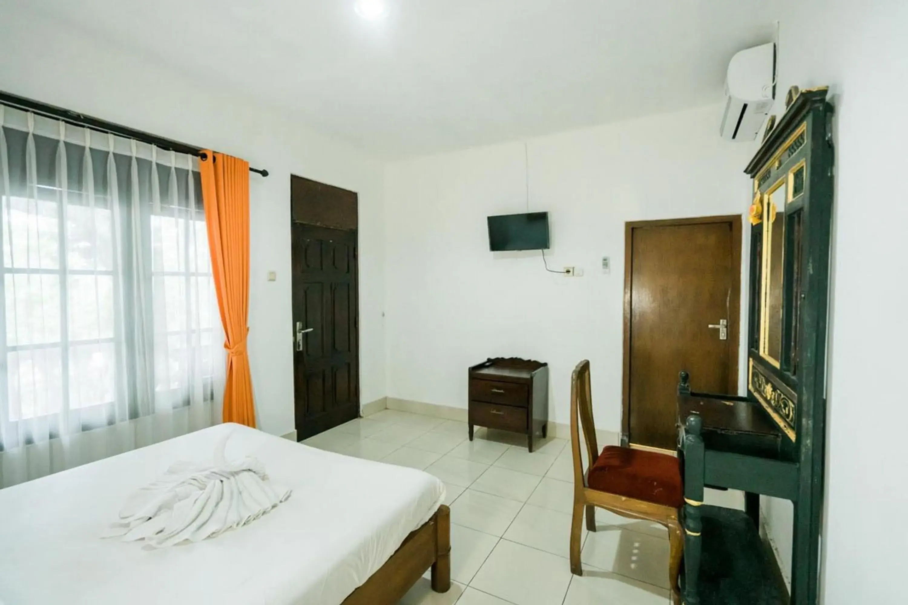 Bed in Urbanview Hotel Ananda Beach Sanur Bed in Urbanview Hotel Ananda Beach Sanur