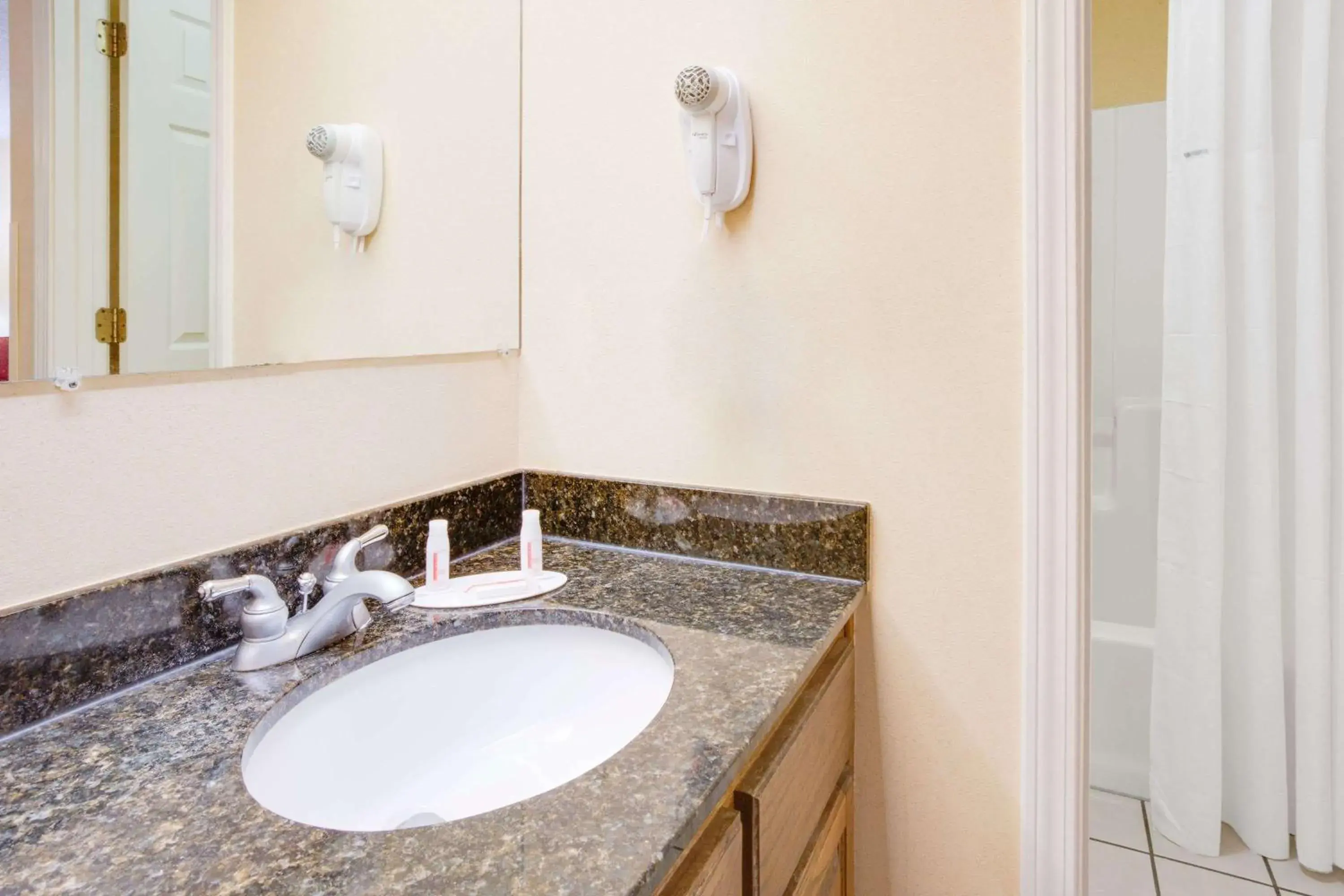 Bathroom in Baymont by Wyndham Ozark Bathroom in Baymont by Wyndham Ozark
