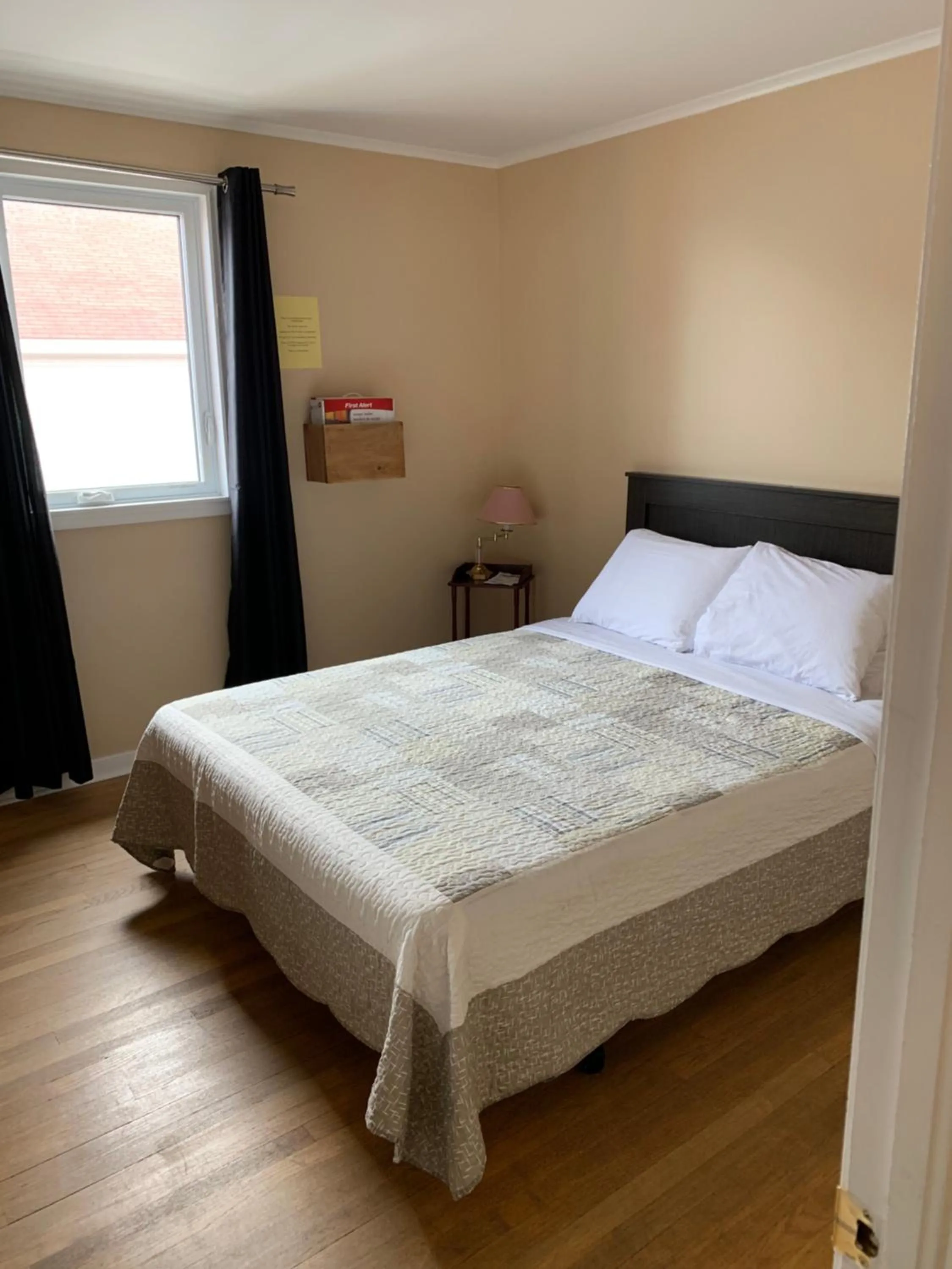 Bed in Exploits Inn and Suites