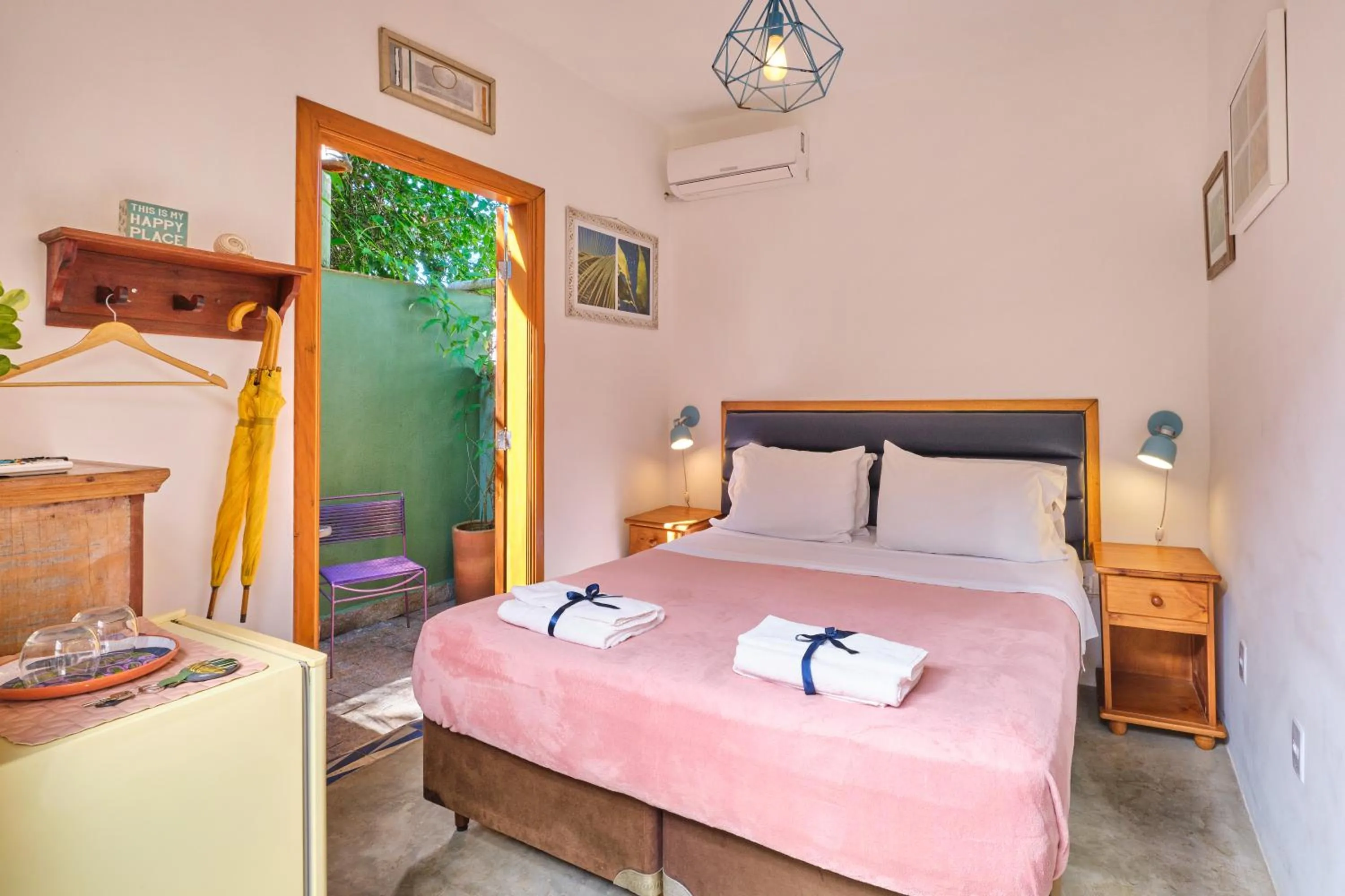 Bed in Pousada Pontal Gardens