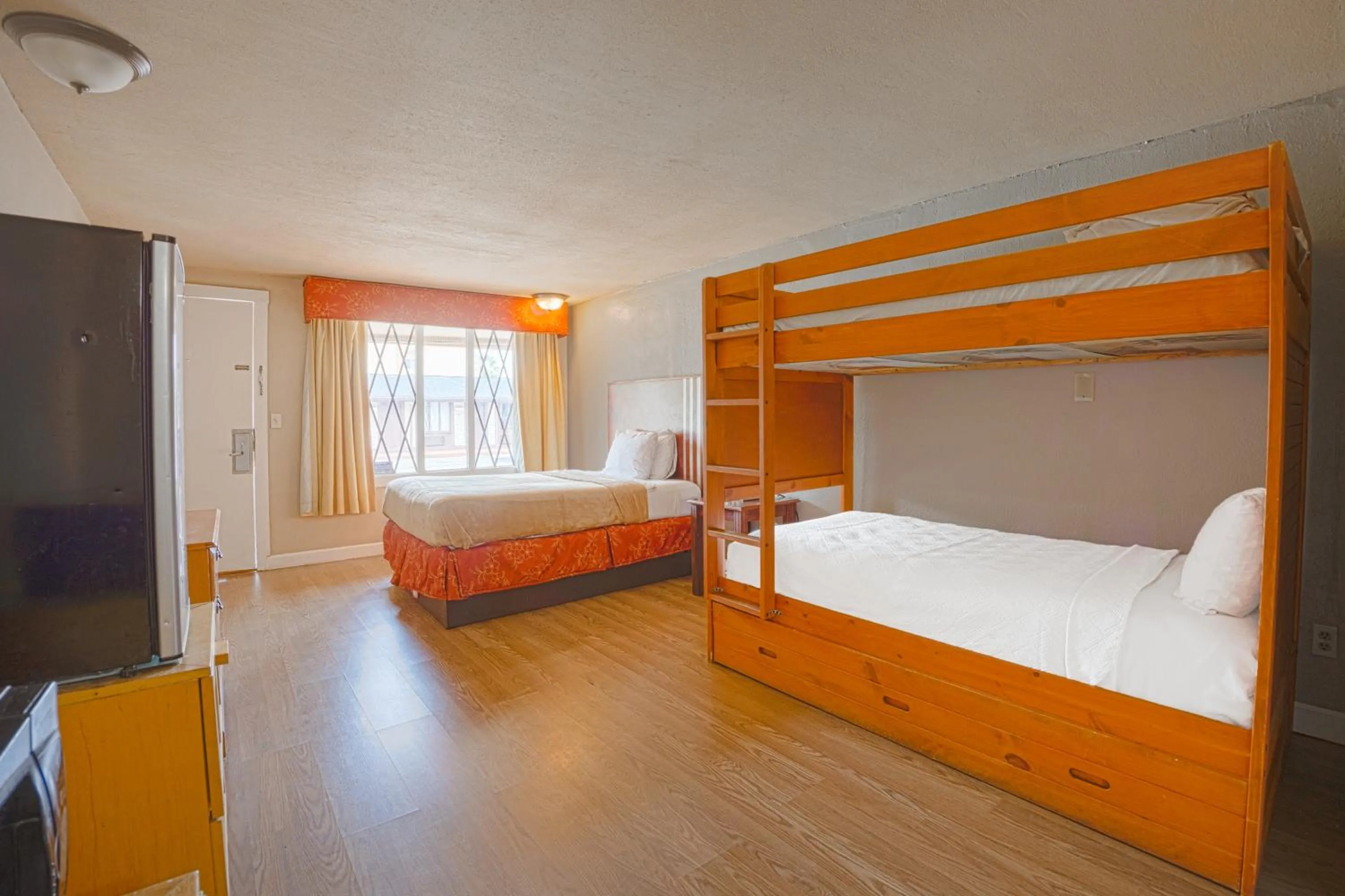 Bedroom, Bed in Liberty Garden Inn by OYO Kissimmee near Disney World