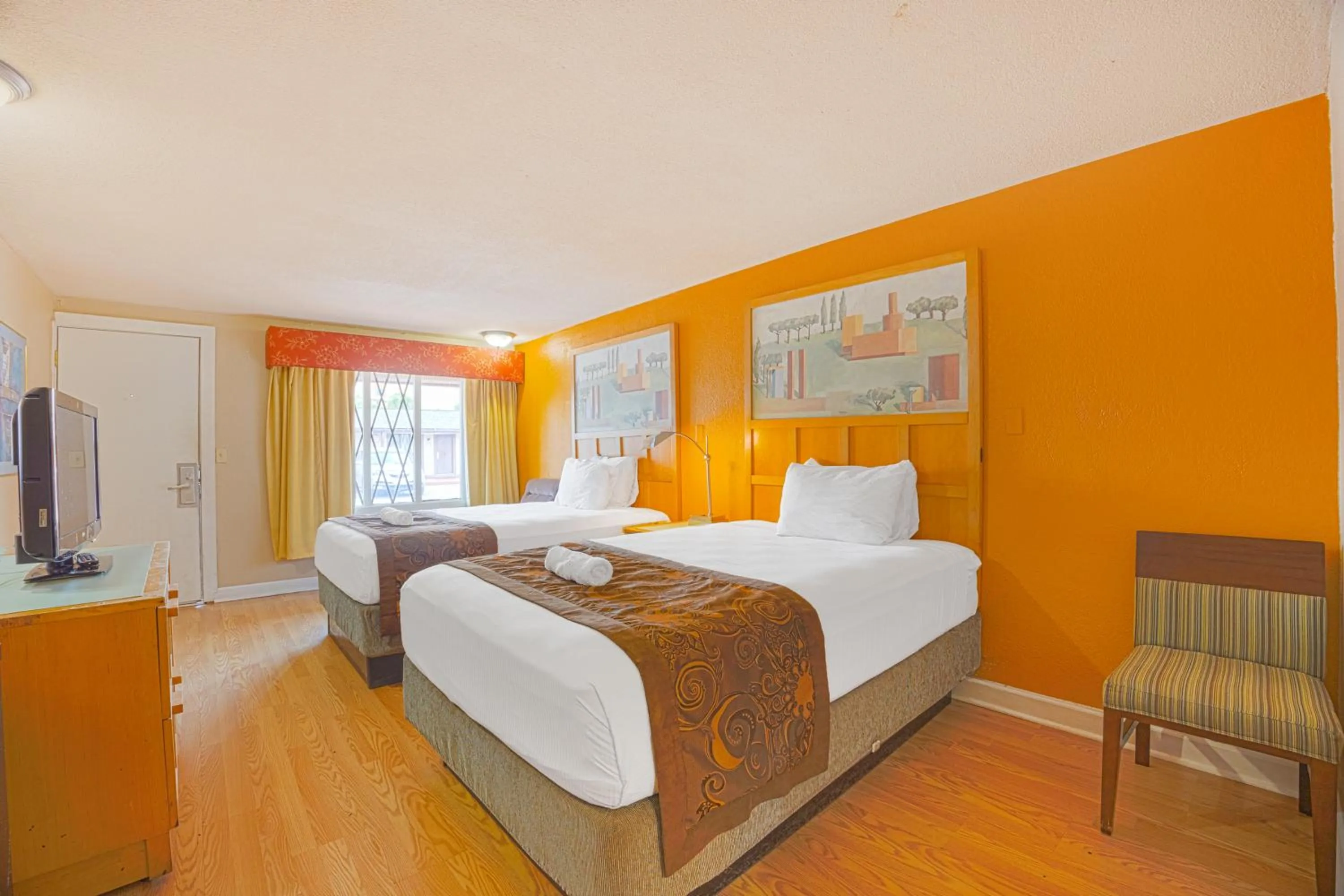 Bedroom, Bed in Liberty Garden Inn by OYO Kissimmee near Disney World